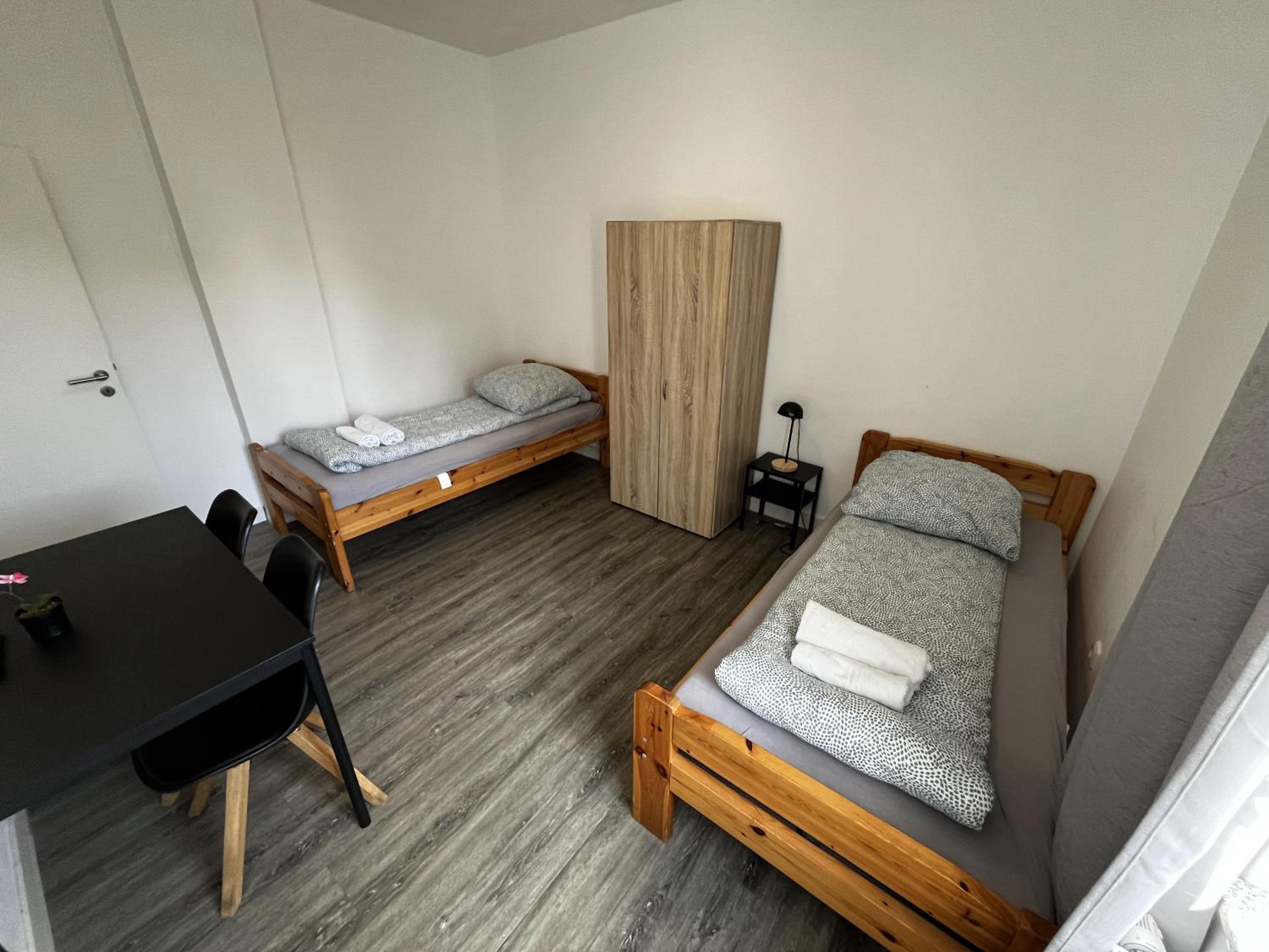 Two-Bedroom Private Suites with Bathroom & Kitchenette