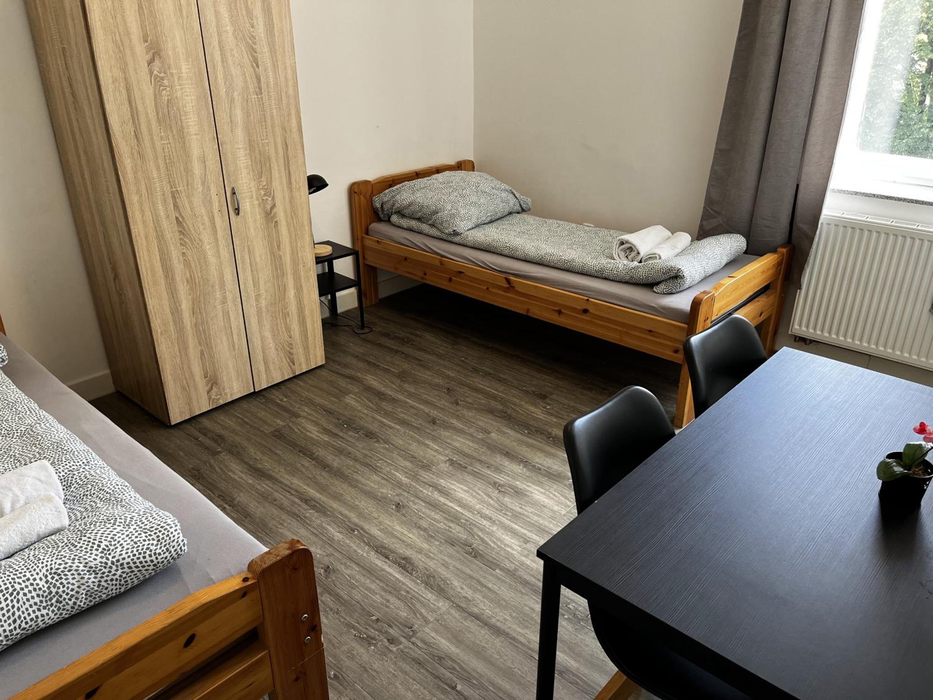Two-Bedroom Private Suites with Bathroom & Kitchenette