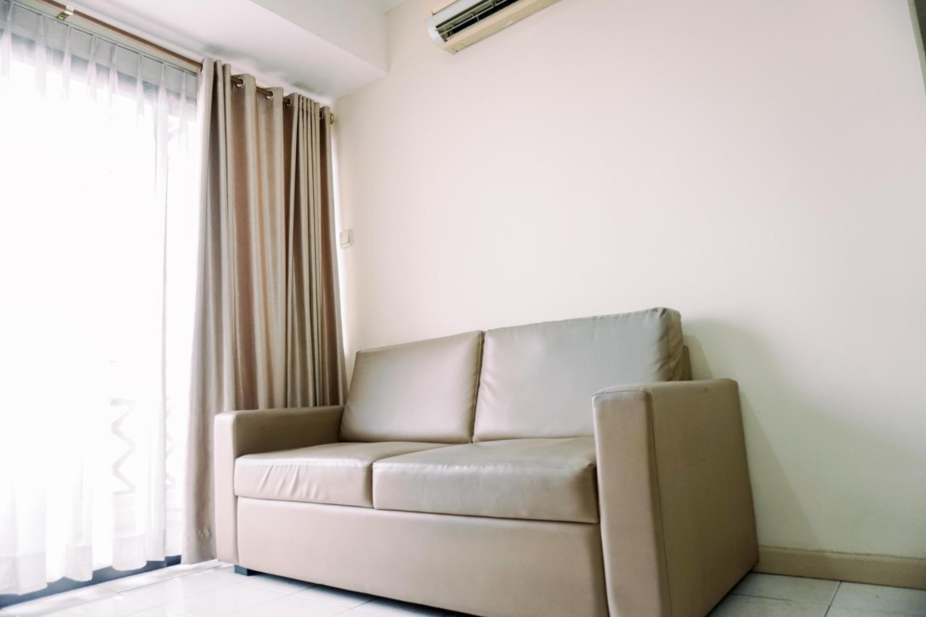 Elegant and Comfortable 2BR Puri Garden Apartment By Travelio view 3