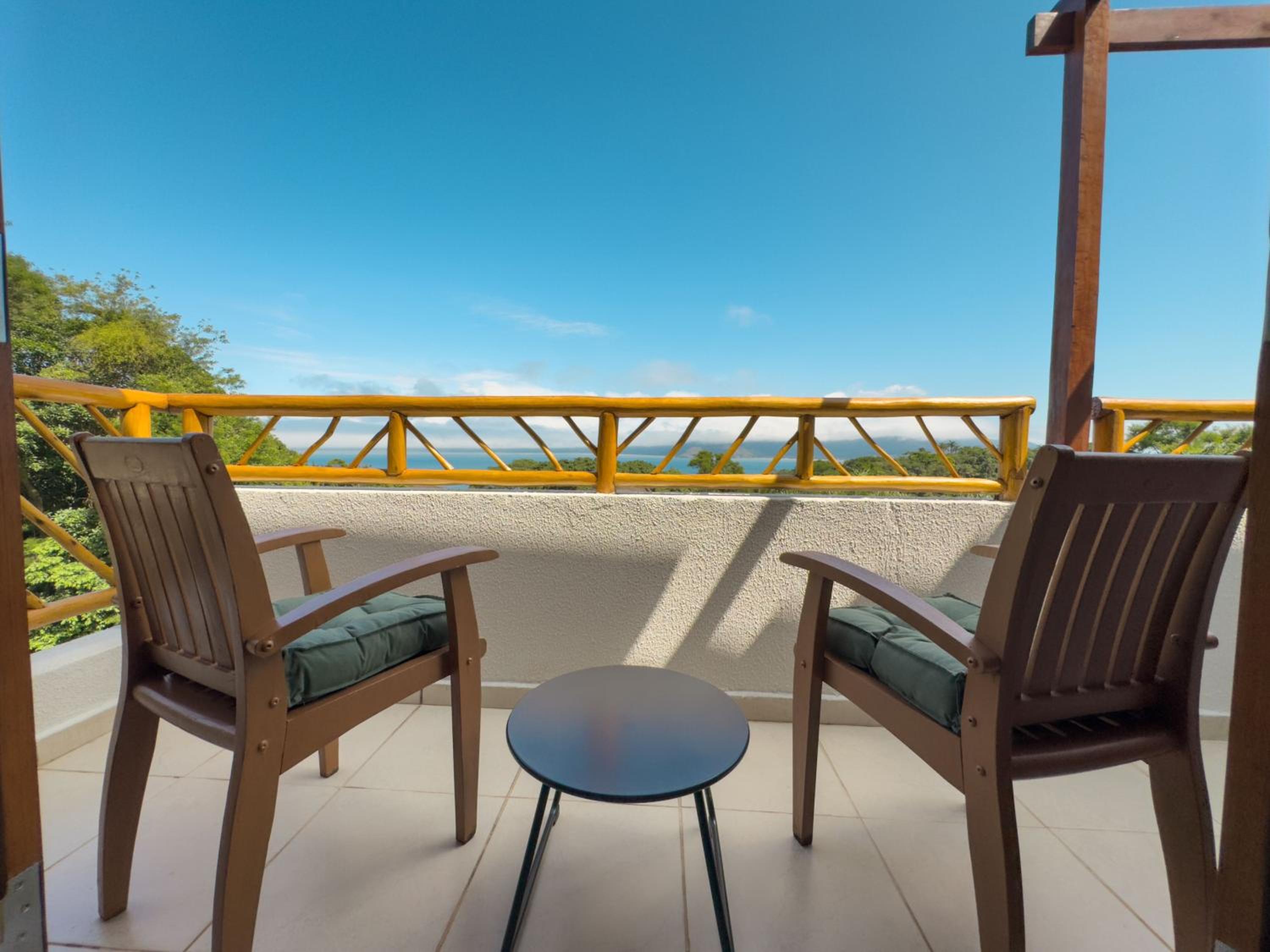 A Casa 46 Ilhabela - Praia do Curral - Refúgio à Beira-Mar, Condominio Yacamim