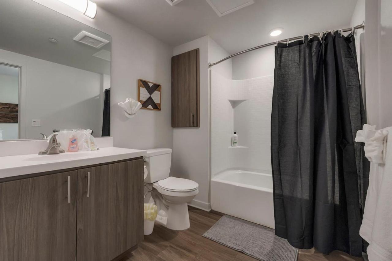 Woodsy style King Bedroom Suite Bath w Pool view 2