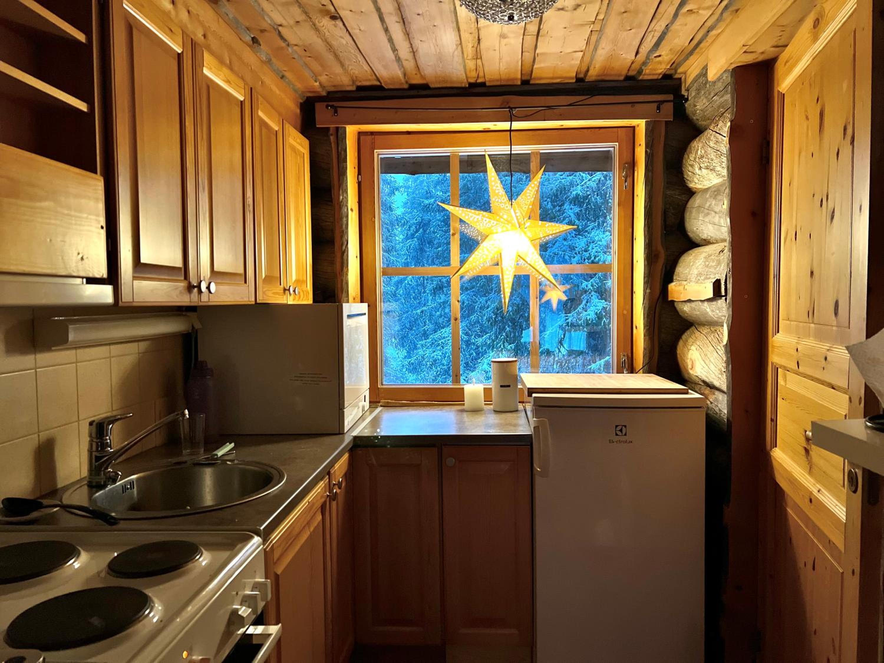 Luosto Jylhäkelo - a cozy loghouse in the heart of Lapland view 2