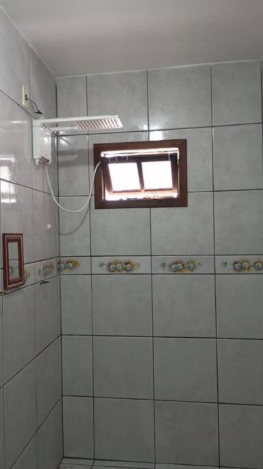 Casa pé na área