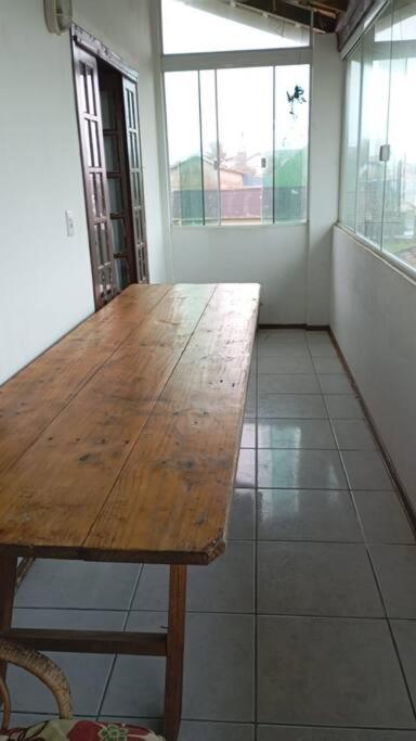 Casa pé na área