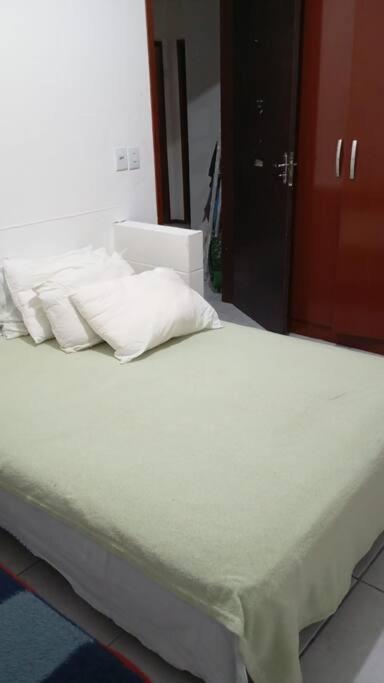 Casa pé na área