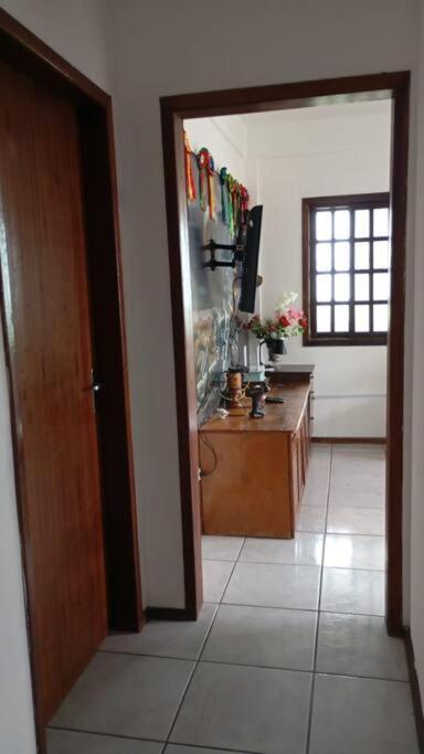 Casa pé na área