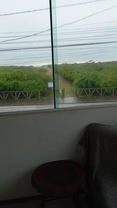 Casa pé na área