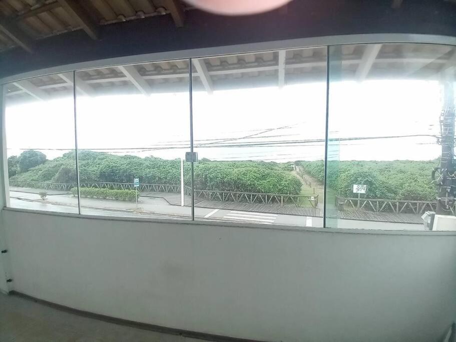 Casa pé na área