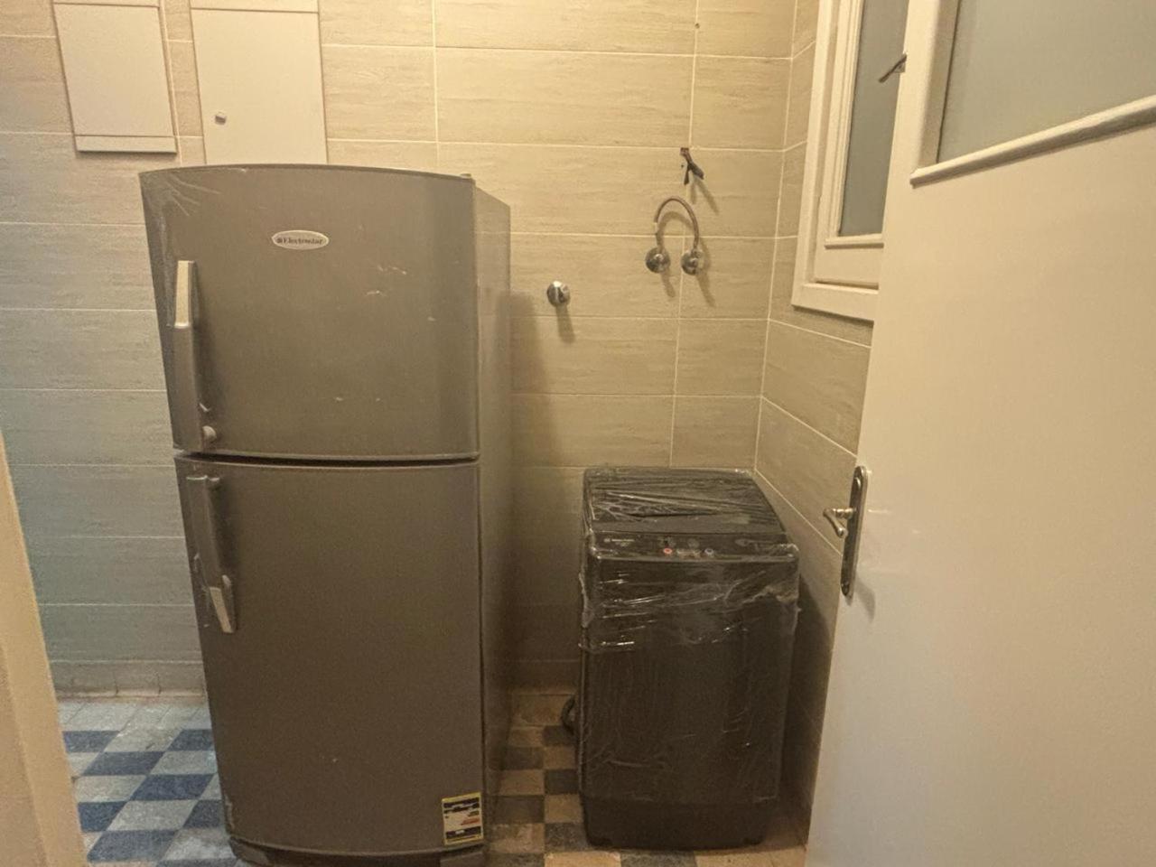 A room in A spacious shared Apartment in garden city, A prime location in central Cairo