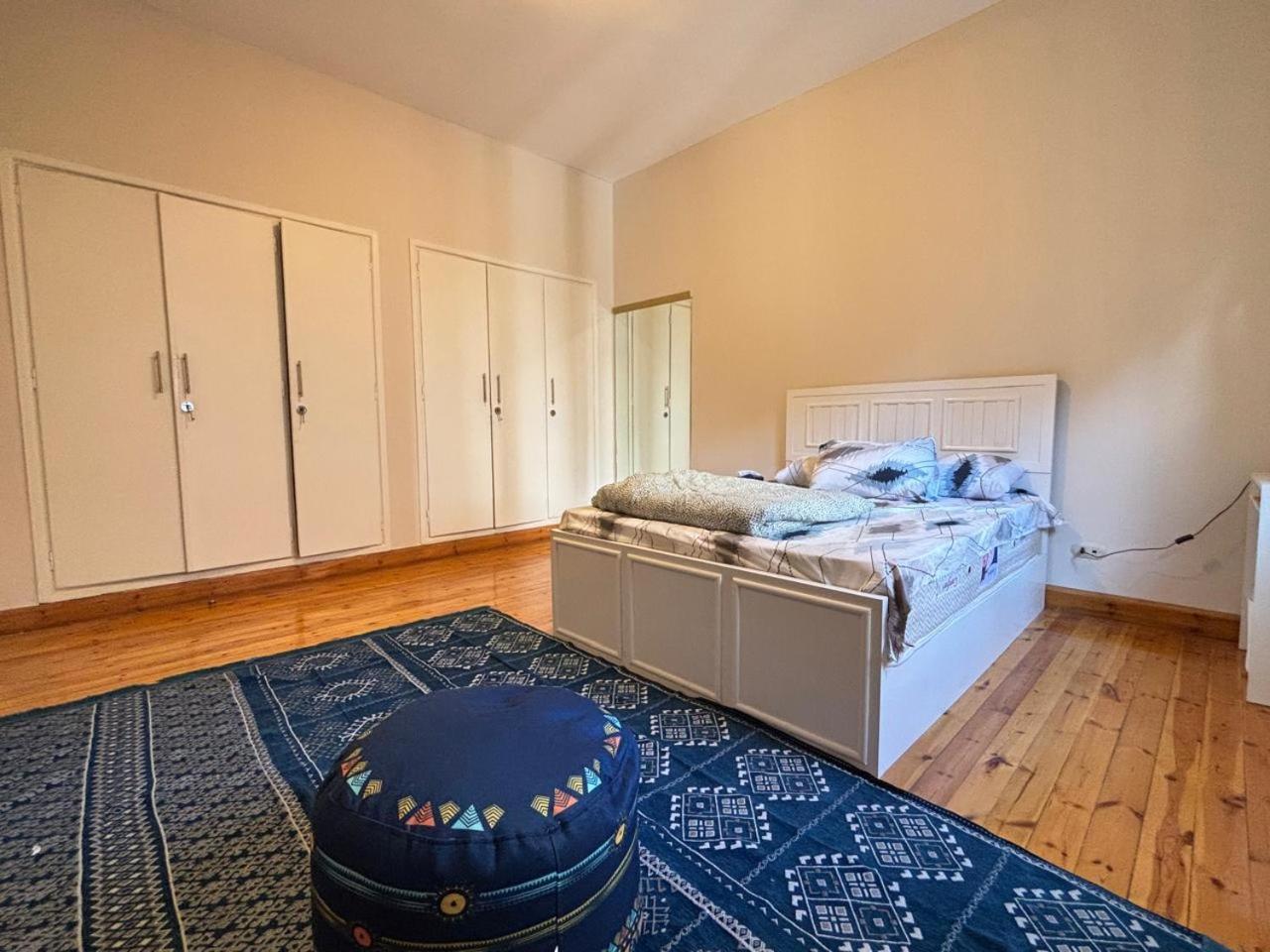 A room in A spacious shared Apartment in garden city, A prime location in central Cairo
