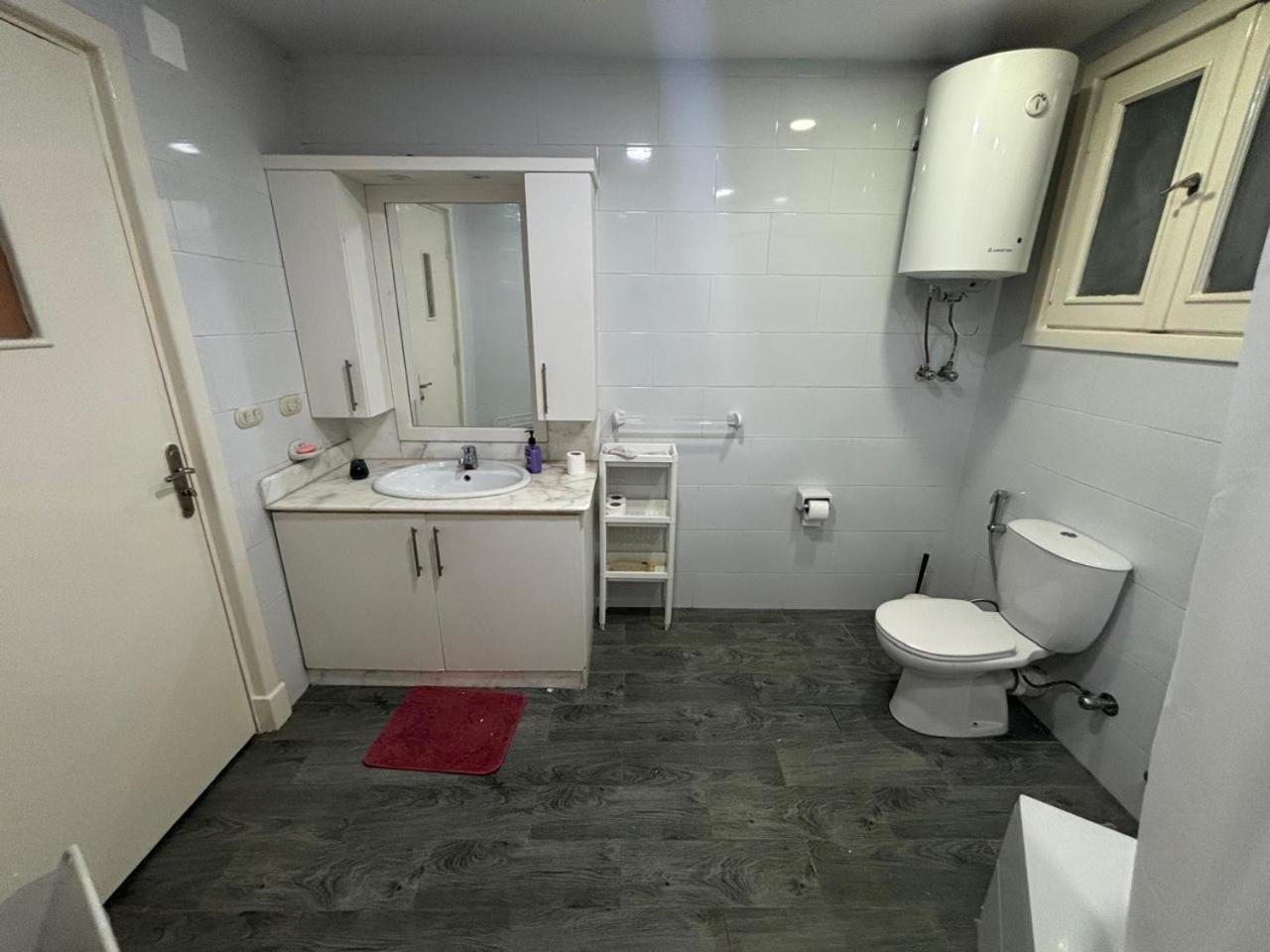 A room in A spacious shared Apartment in garden city, A prime location in central Cairo