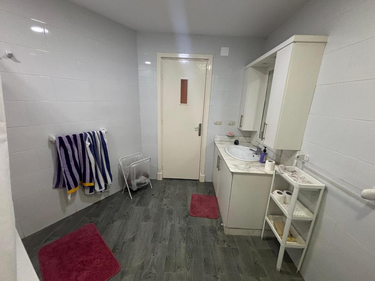 A room in A spacious shared Apartment in garden city, A prime location in central Cairo