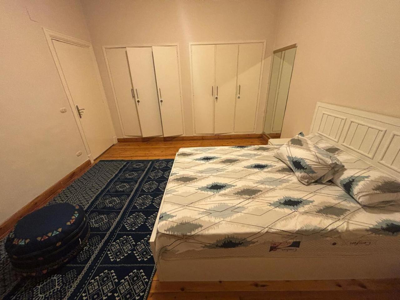 A room in A spacious shared Apartment in garden city, A prime location in central Cairo