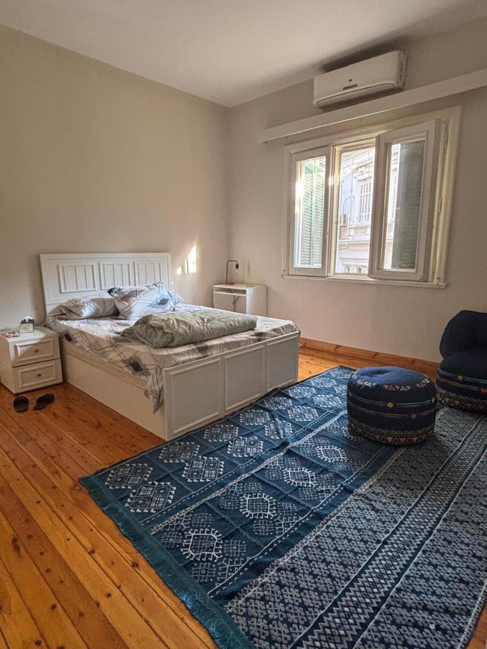 A room in A spacious shared Apartment in garden city, A prime location in central Cairo