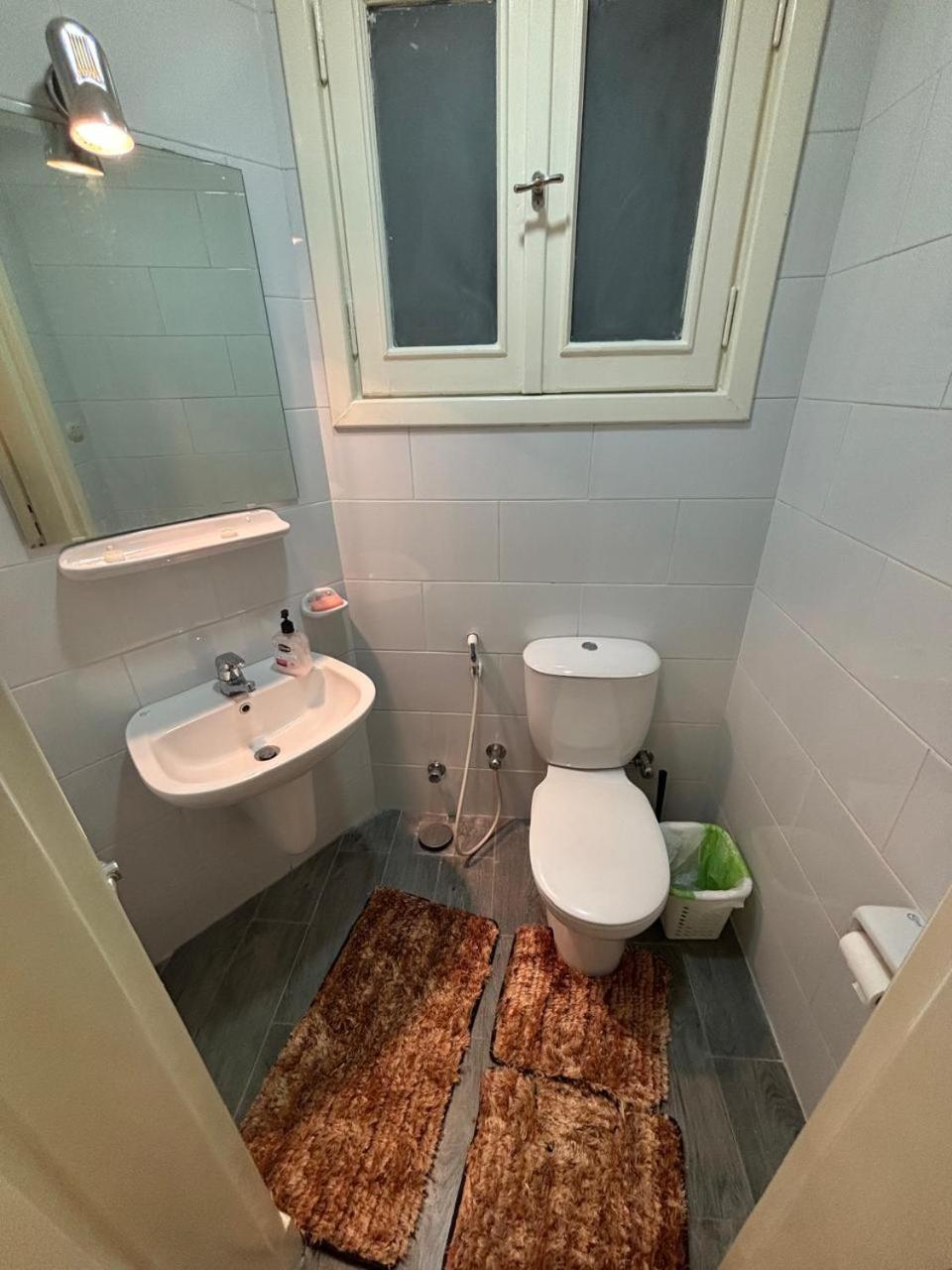 A room in A spacious shared Apartment in garden city, A prime location in central Cairo