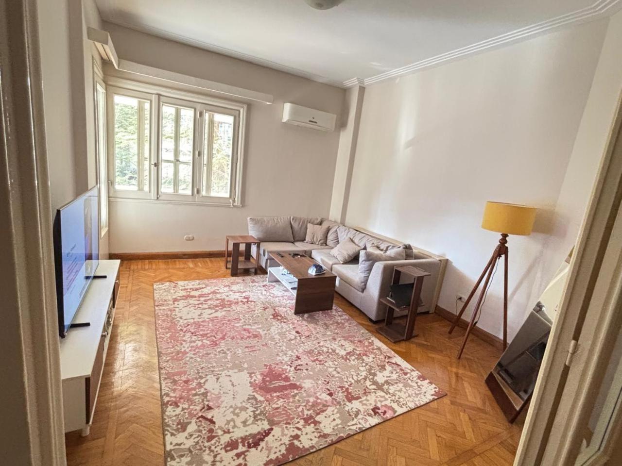 A room in A spacious shared Apartment in garden city, A prime location in central Cairo