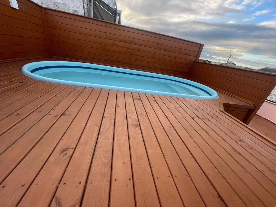 Casa no segundo andar com piscina