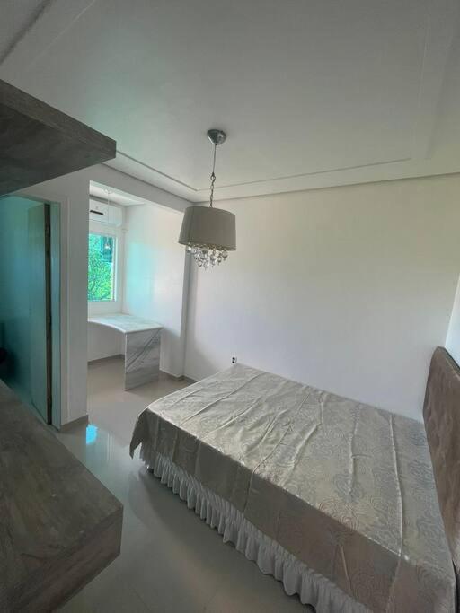 Casa no segundo andar com piscina