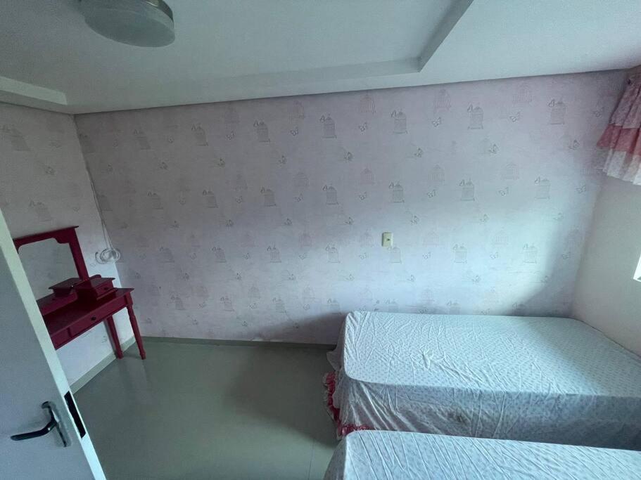 Casa no segundo andar com piscina