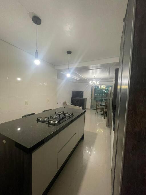 Casa no segundo andar com piscina
