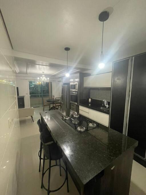 Casa no segundo andar com piscina