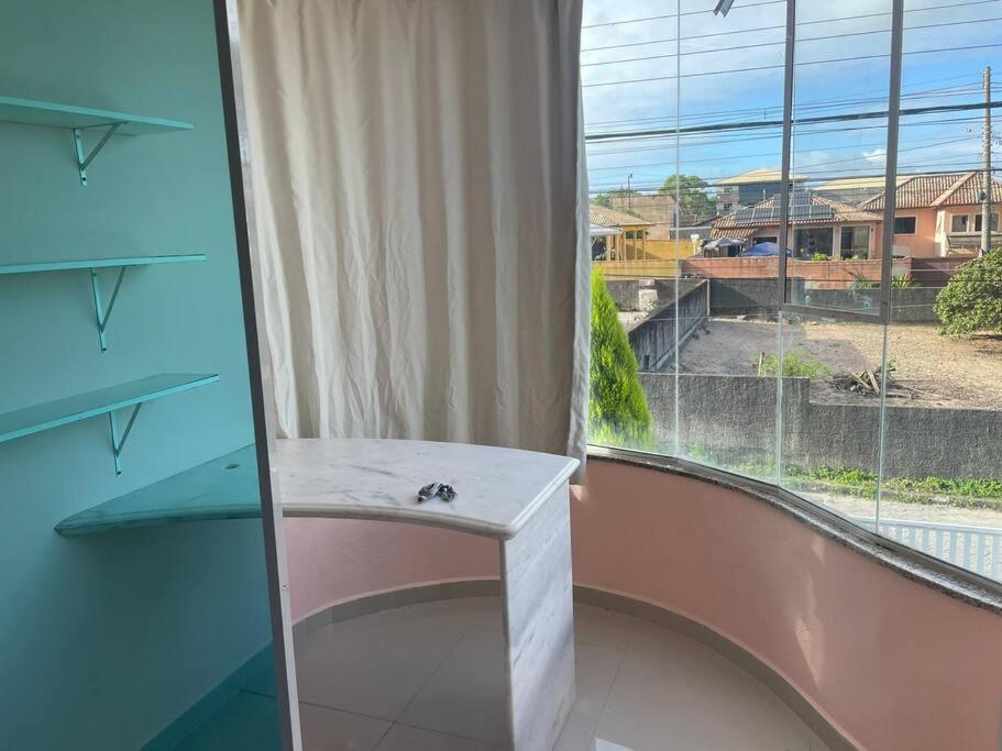 Casa no segundo andar com piscina