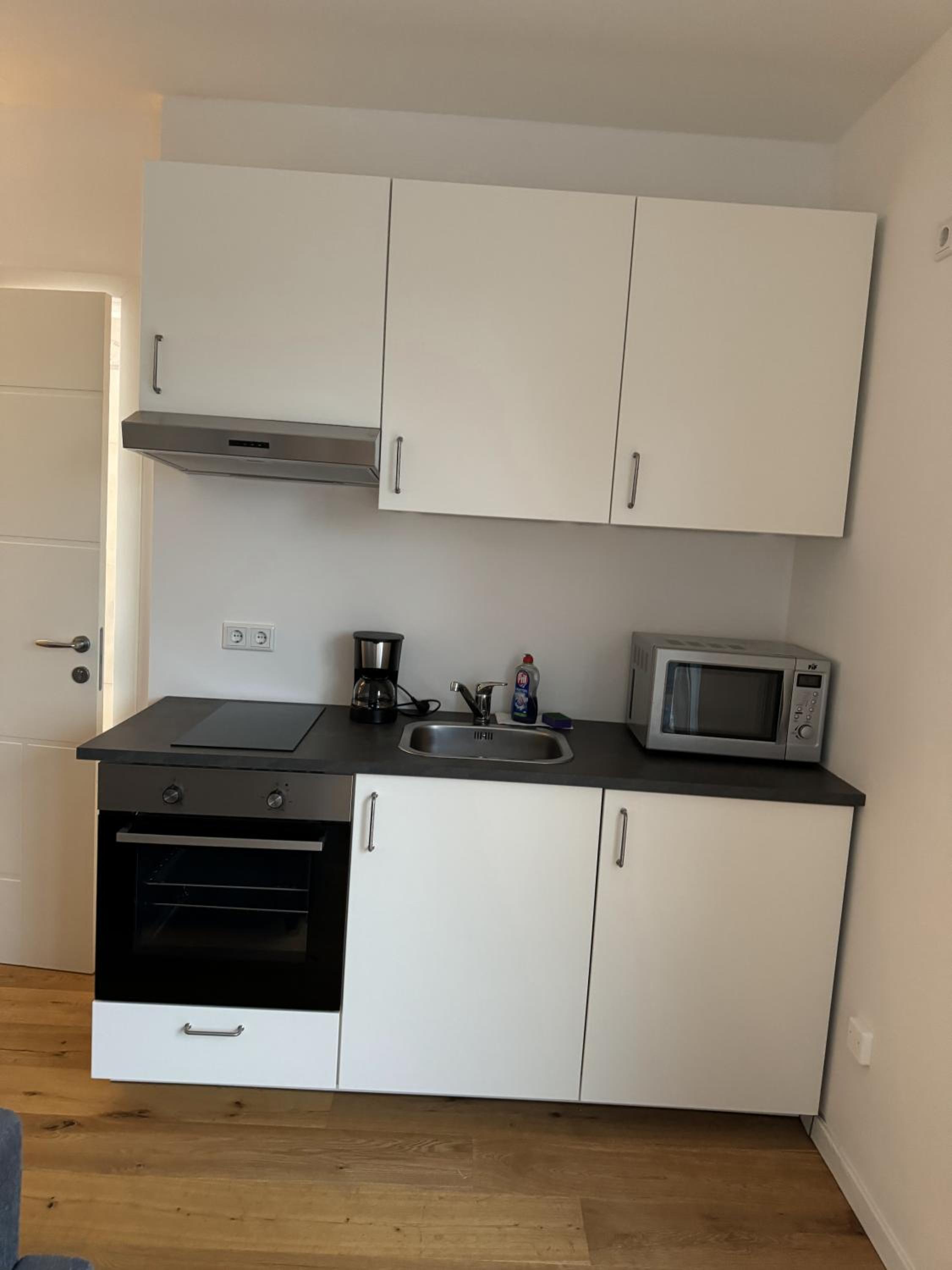 Modern Apartments with Kitchen & Balcony Dining