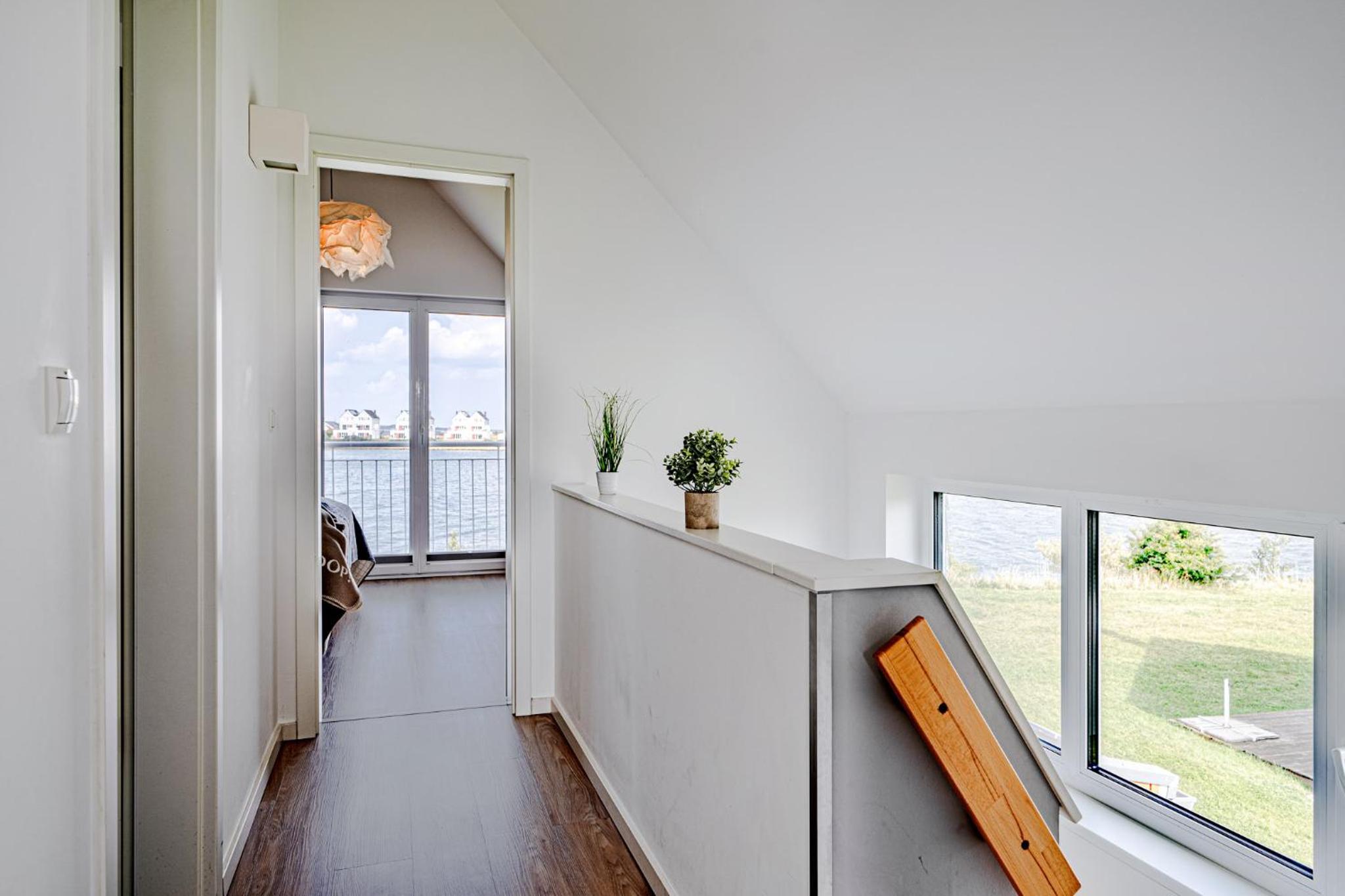 Ferienhaus An der Ostsee by Seeblick Ferien ORO, direkte Wasserlage,Sauna, E-Säule