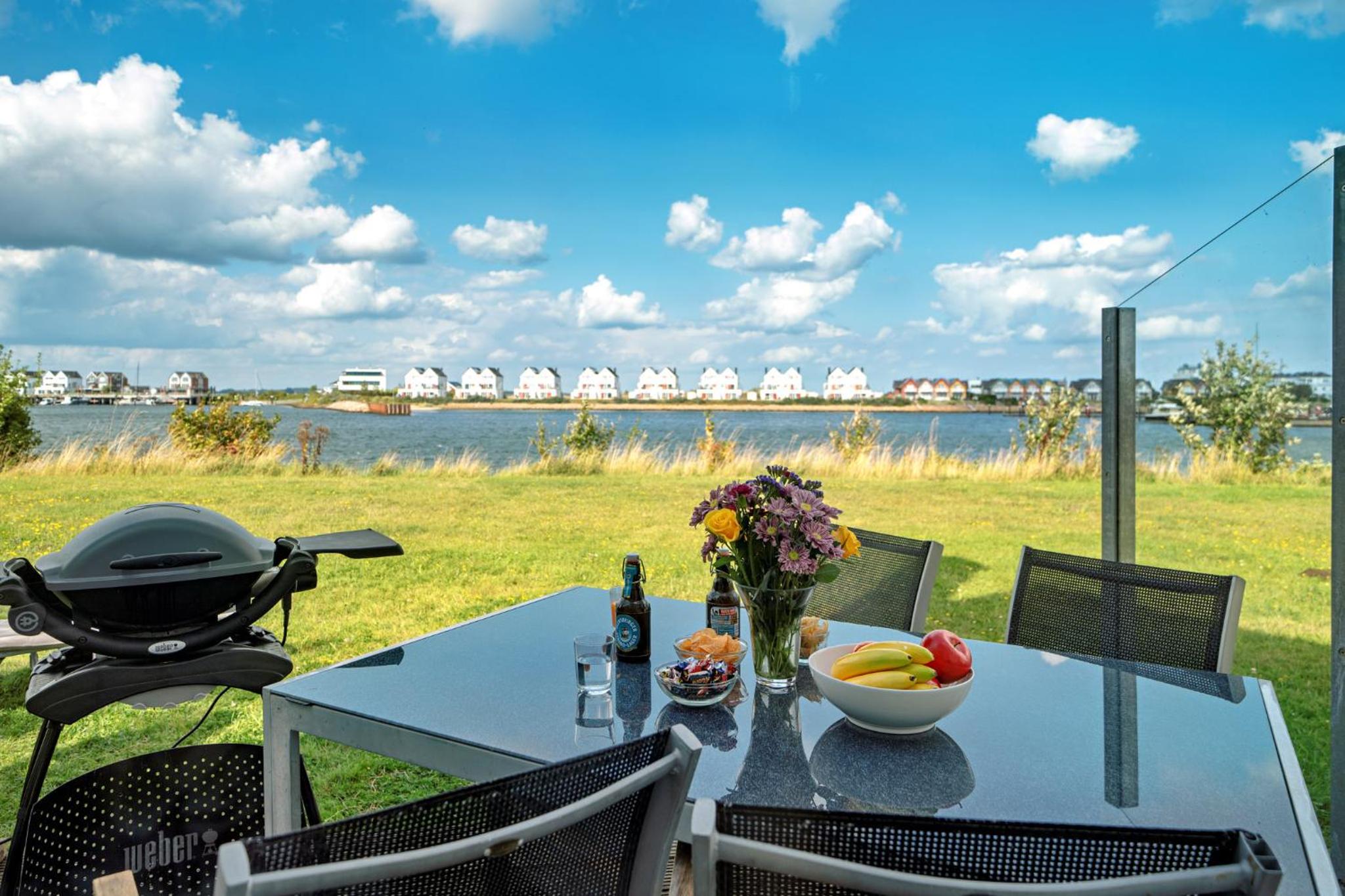 Ferienhaus An der Ostsee by Seeblick Ferien ORO, direkte Wasserlage,Sauna, E-Säule