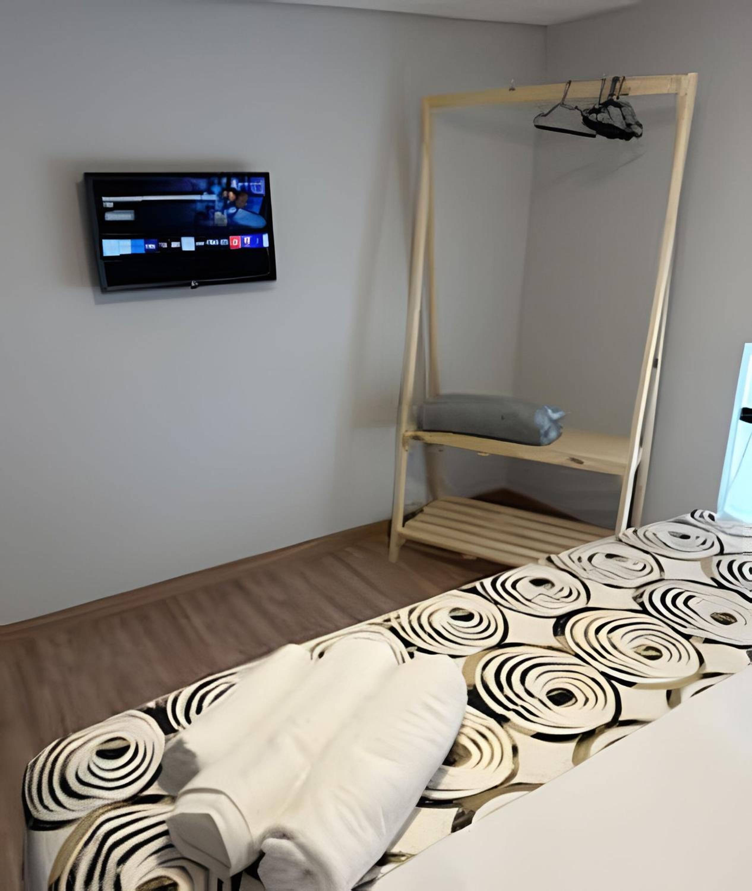 Loft de Luxo no Braga: Perfeito para Casais - Ar, Wi-Fi e Estilo