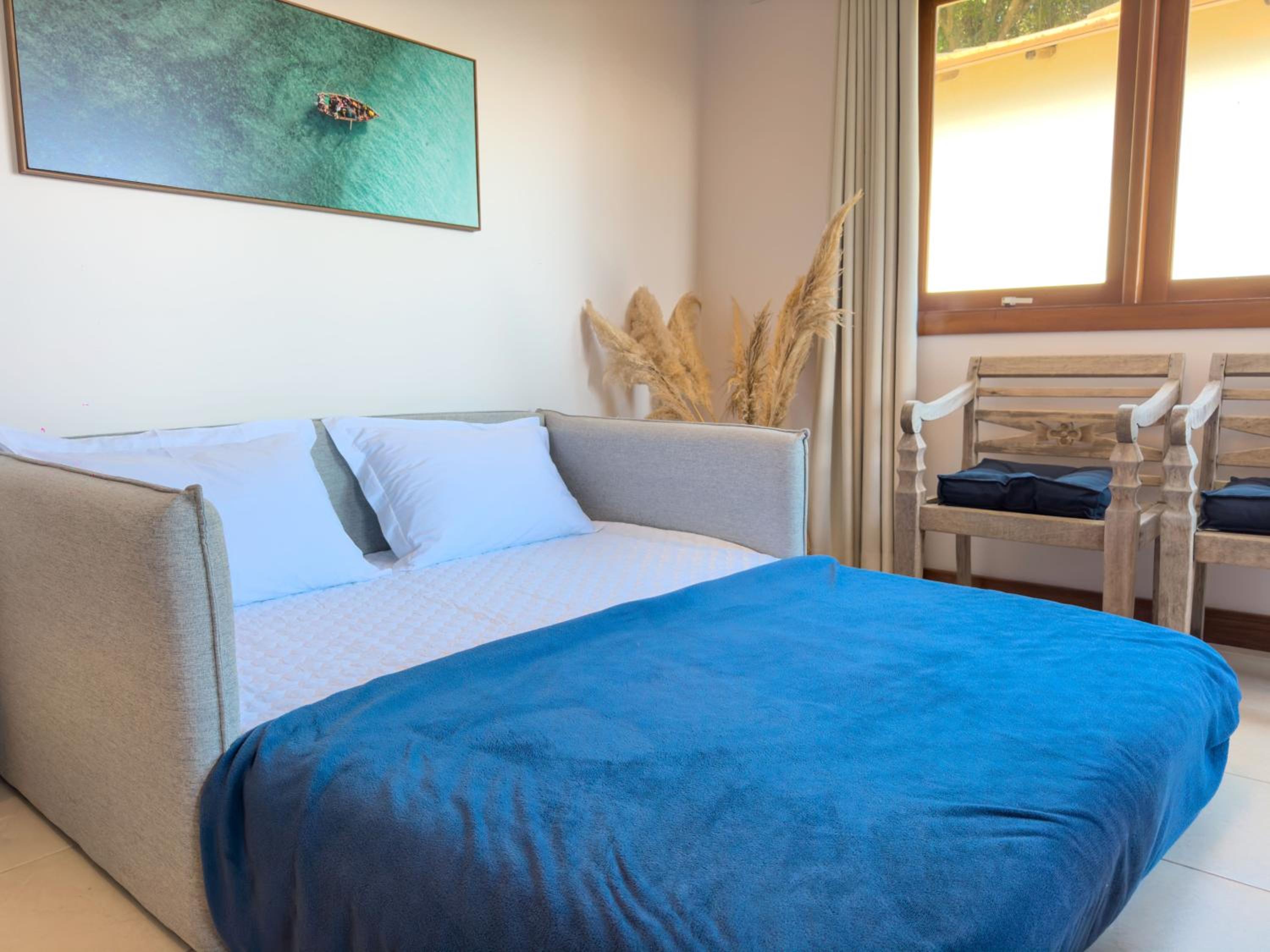 A Casa 46 Ilhabela - Praia do Curral - Refúgio à Beira-Mar, Condominio Yacamim