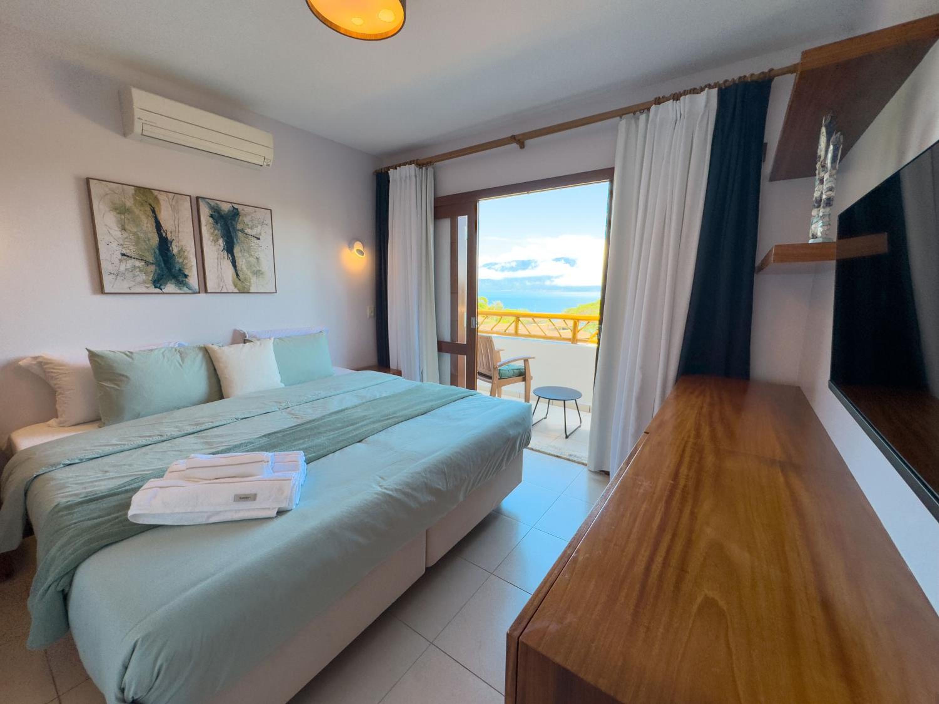 A Casa 46 Ilhabela - Praia do Curral - Refúgio à Beira-Mar, Condominio Yacamim