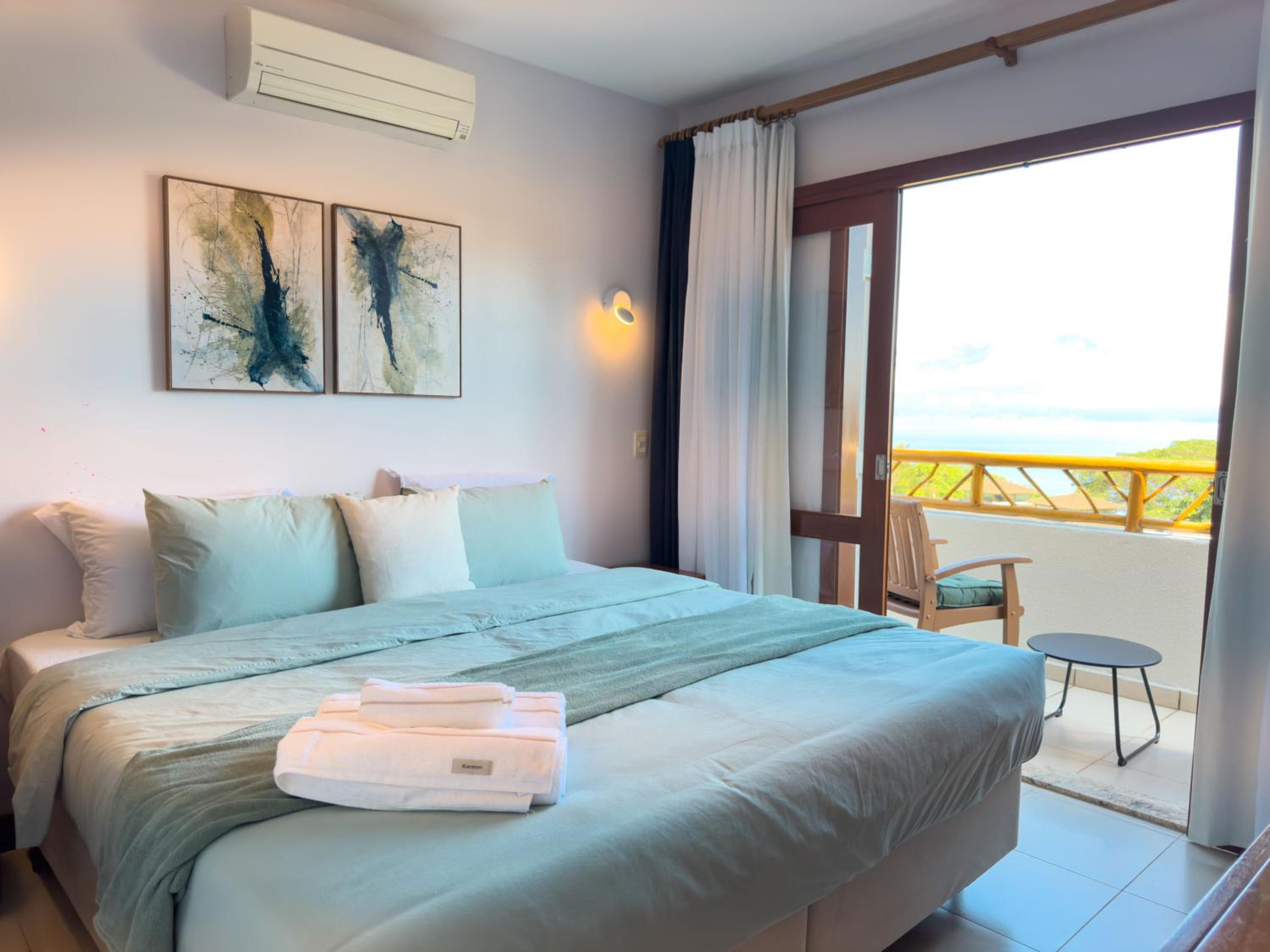 A Casa 46 Ilhabela - Praia do Curral - Refúgio à Beira-Mar, Condominio Yacamim
