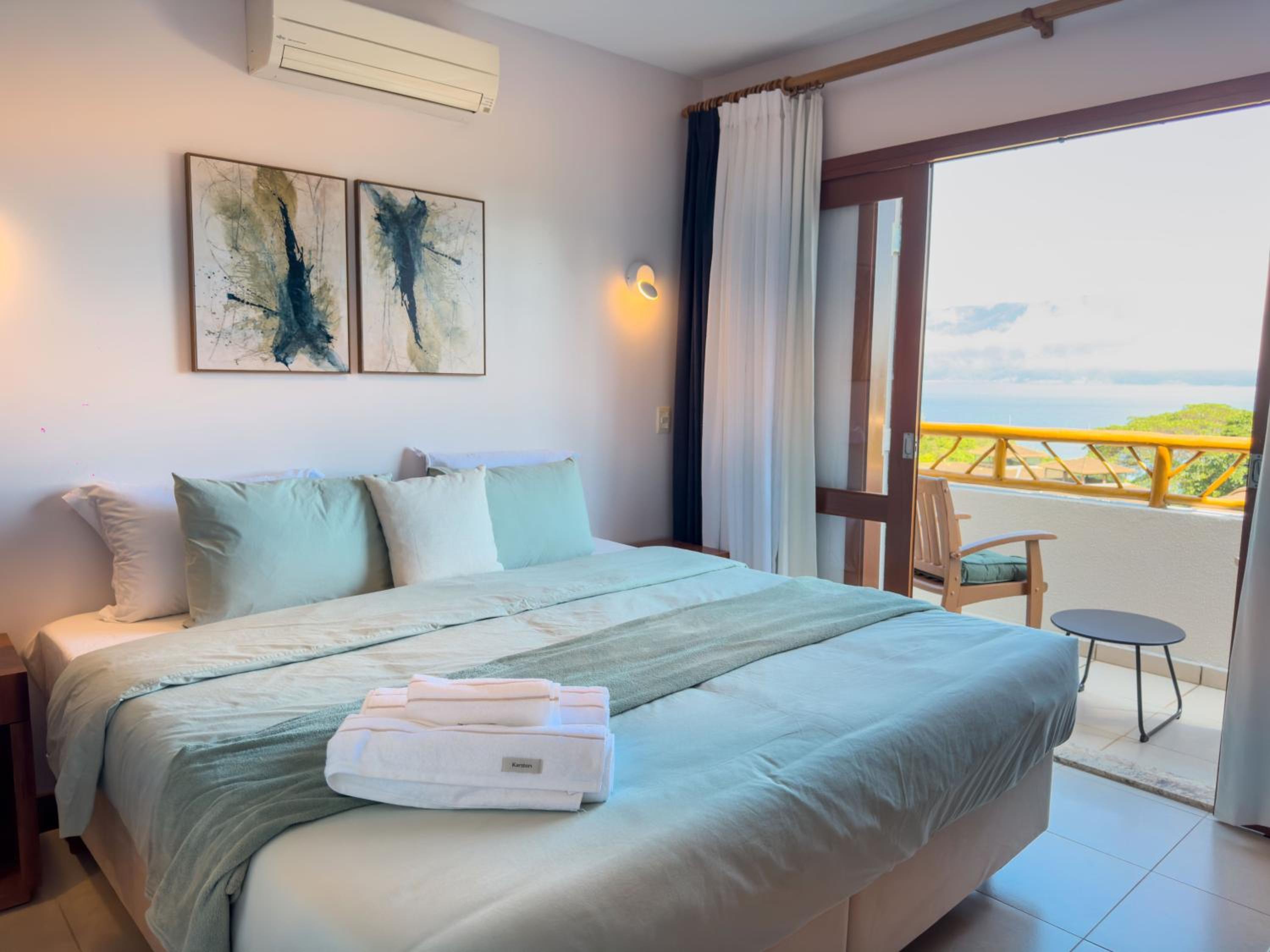 A Casa 46 Ilhabela - Praia do Curral - Refúgio à Beira-Mar, Condominio Yacamim