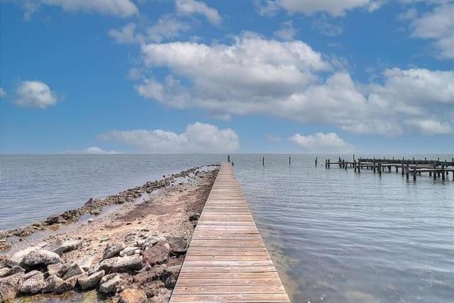Waterfront Escape w Views Shared Pool Boat Dock Orange Crush by AvantStay