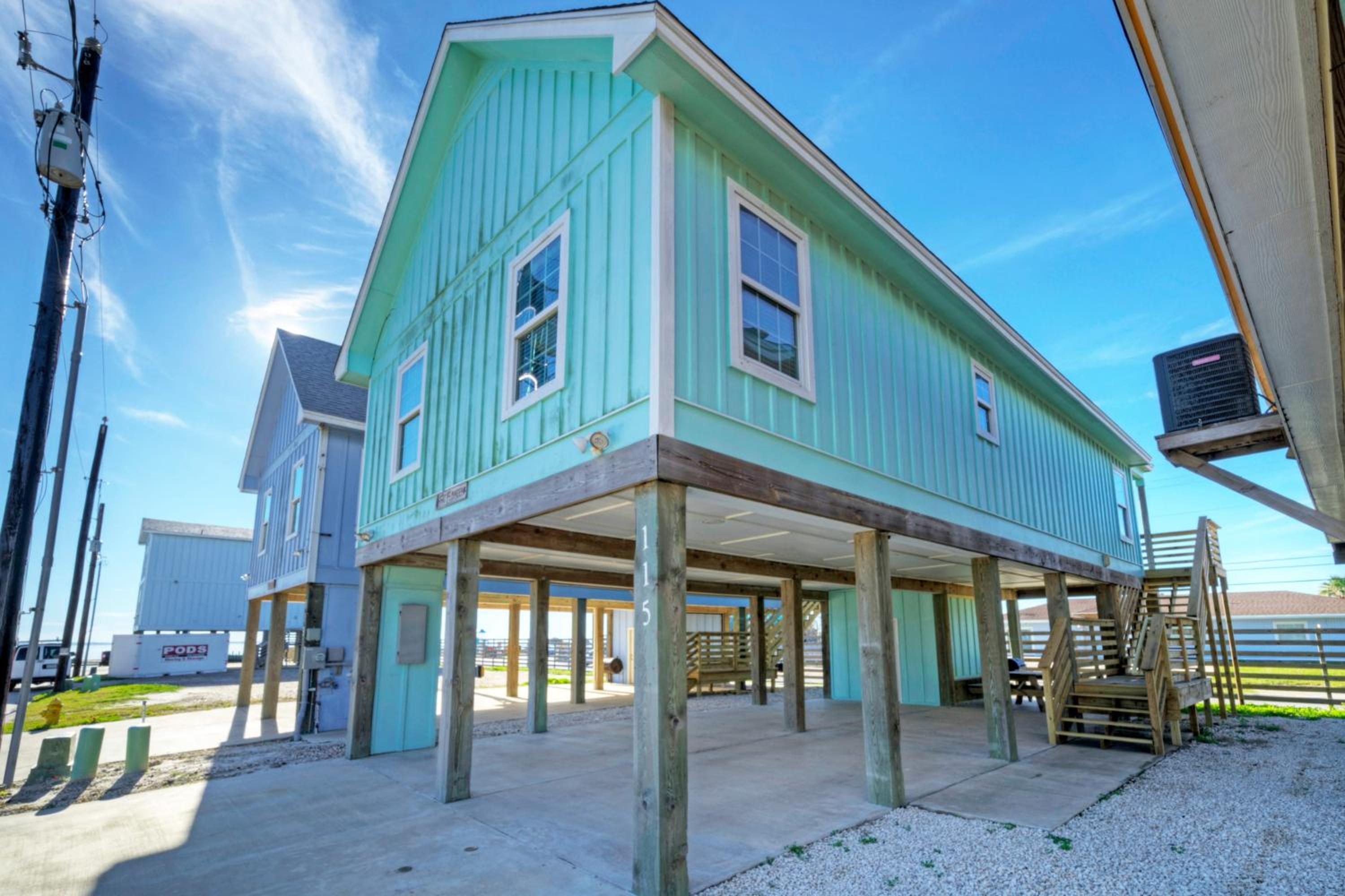 Balcony w Bay View Shared Pool Boat Dock Fat Flounder by AvantStay