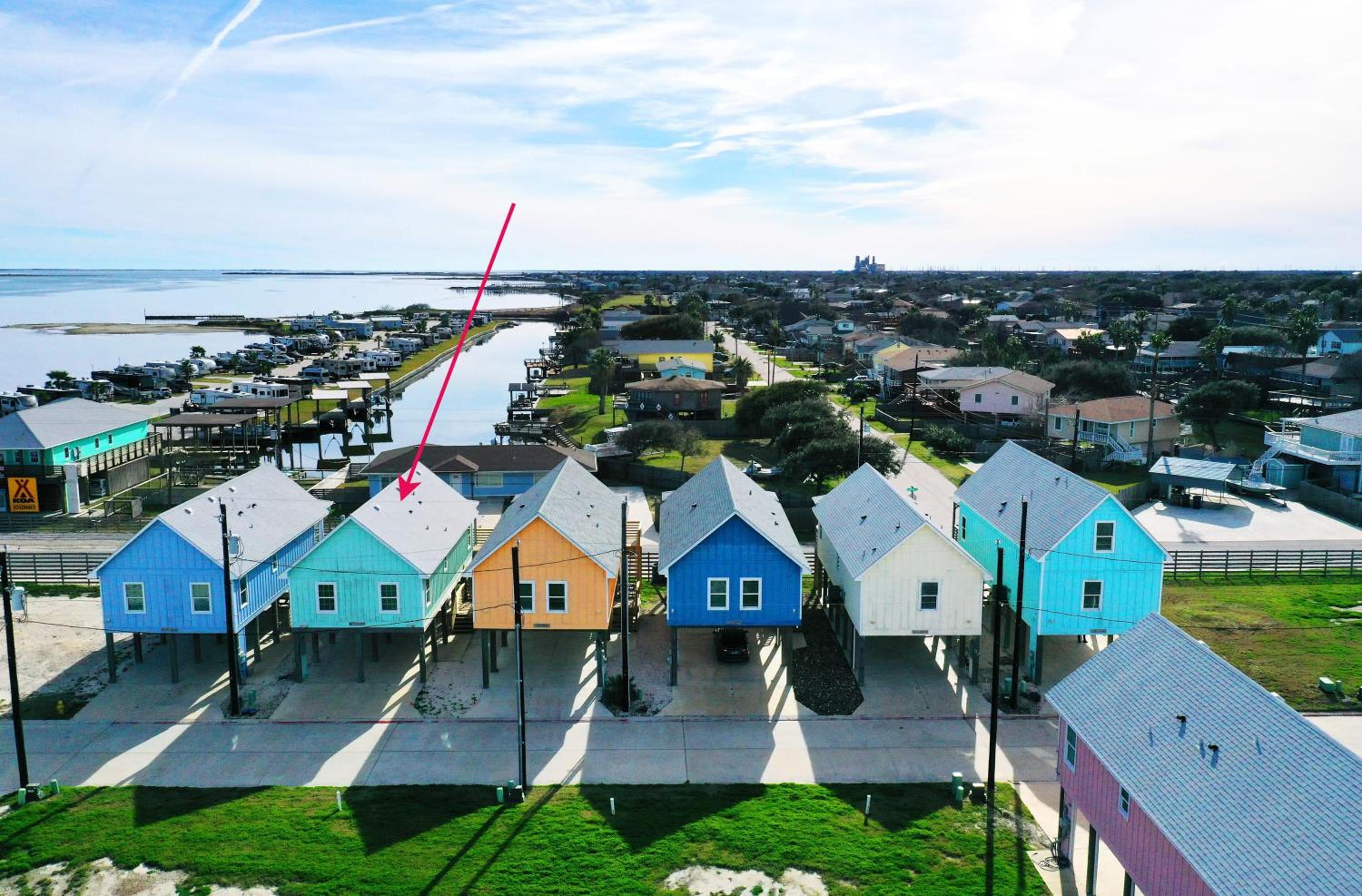 Balcony w Bay View Shared Pool Boat Dock Fat Flounder by AvantStay