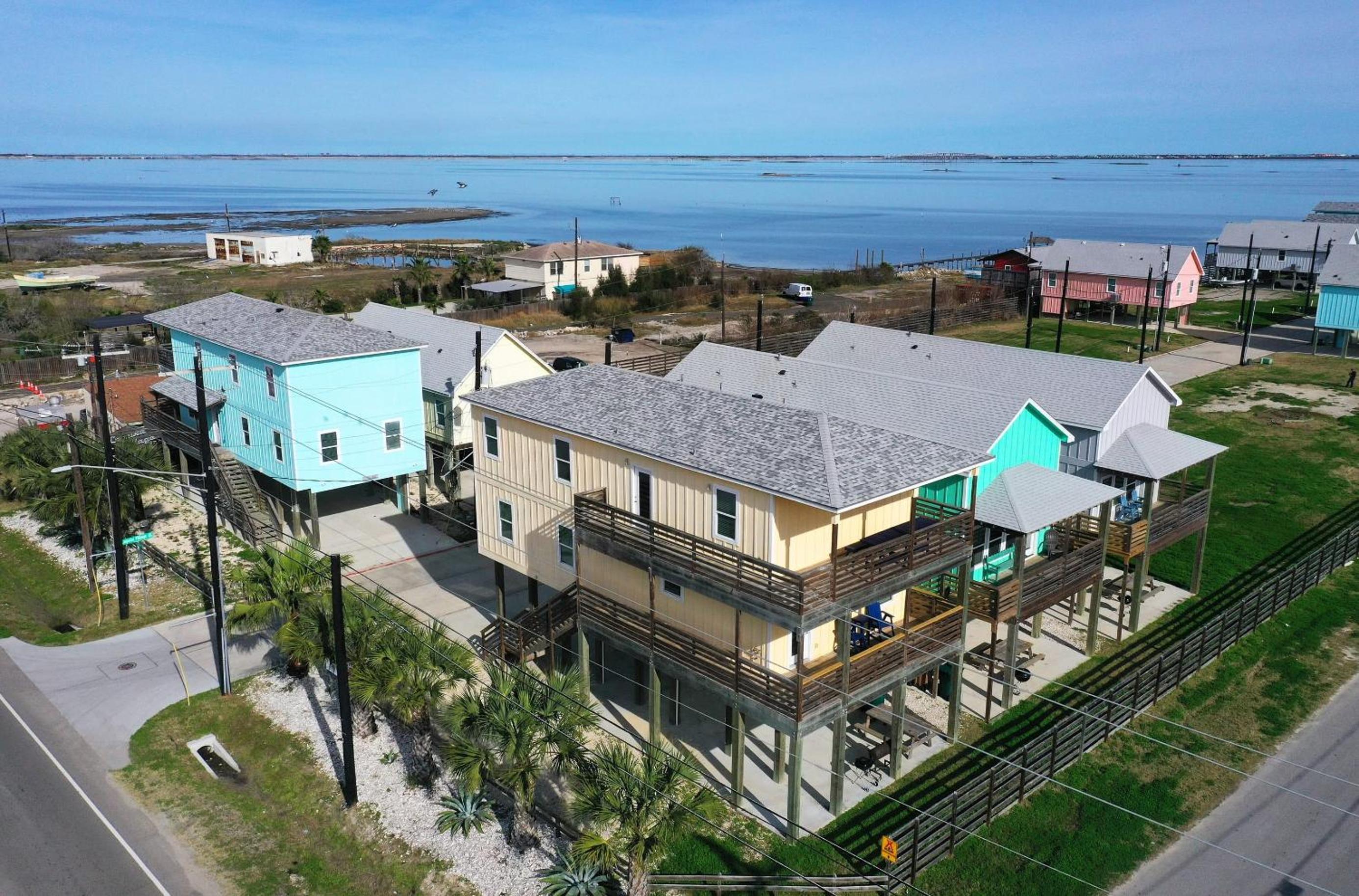 6BDR Balcony w Bay View Shared Pool Boat Dock Keeper Red by AvantStay