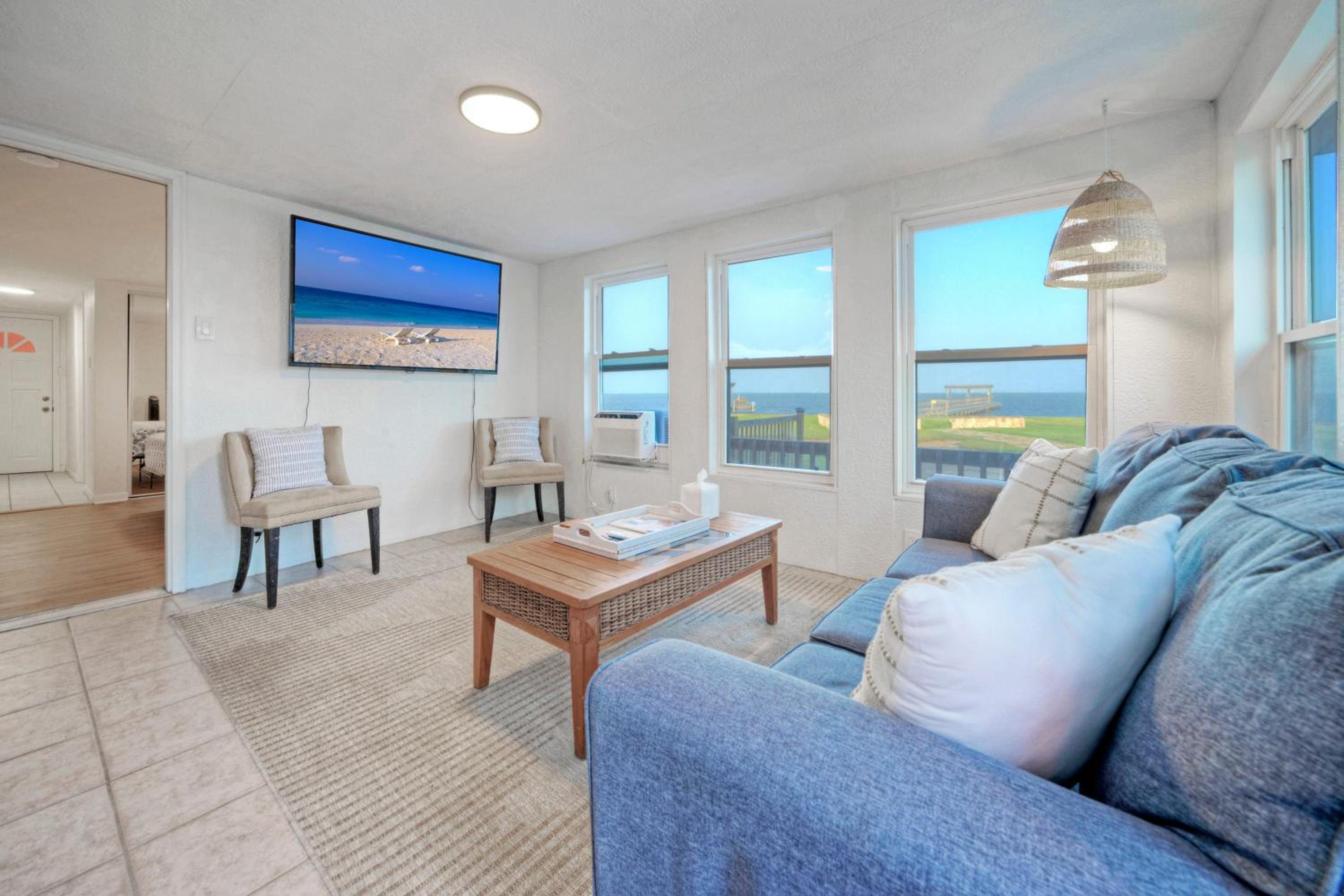 Waterfront Retreat w Private Boat Dock Patio Views Shore Thing by AvantStay
