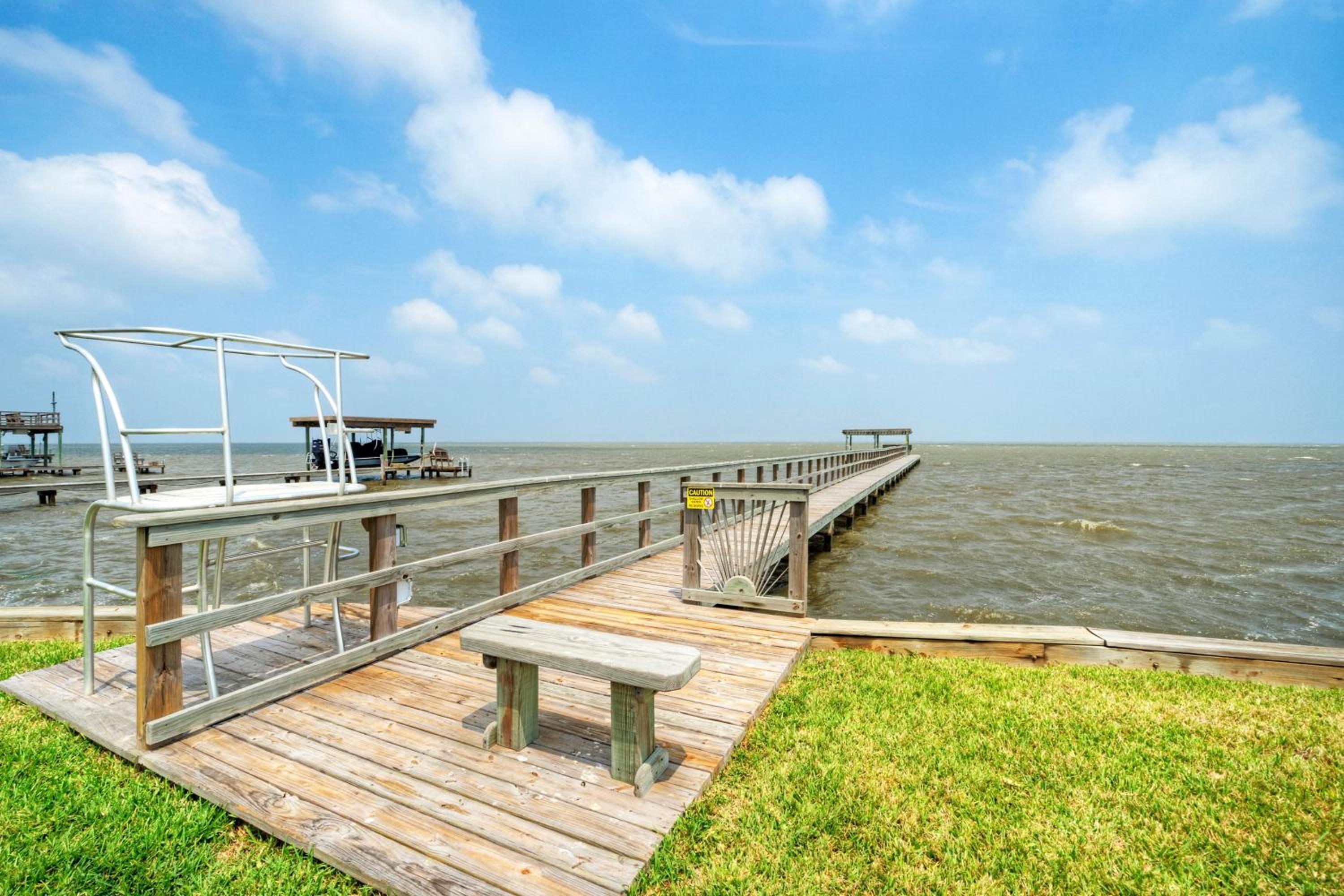 Waterfront Retreat w Private Boat Dock Patio Views Shore Thing by AvantStay