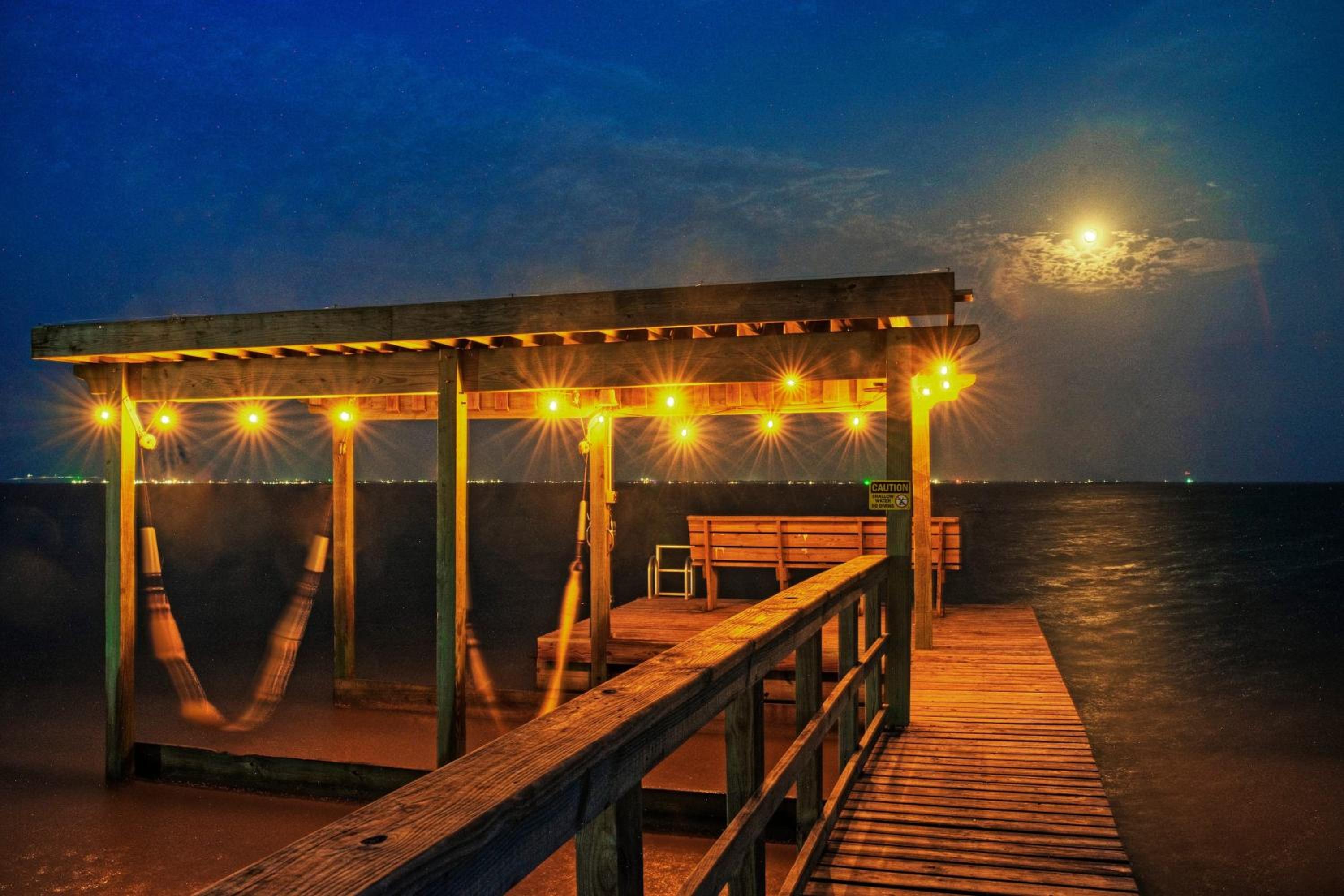 Waterfront Retreat w Private Boat Dock Patio Views Shore Thing by AvantStay