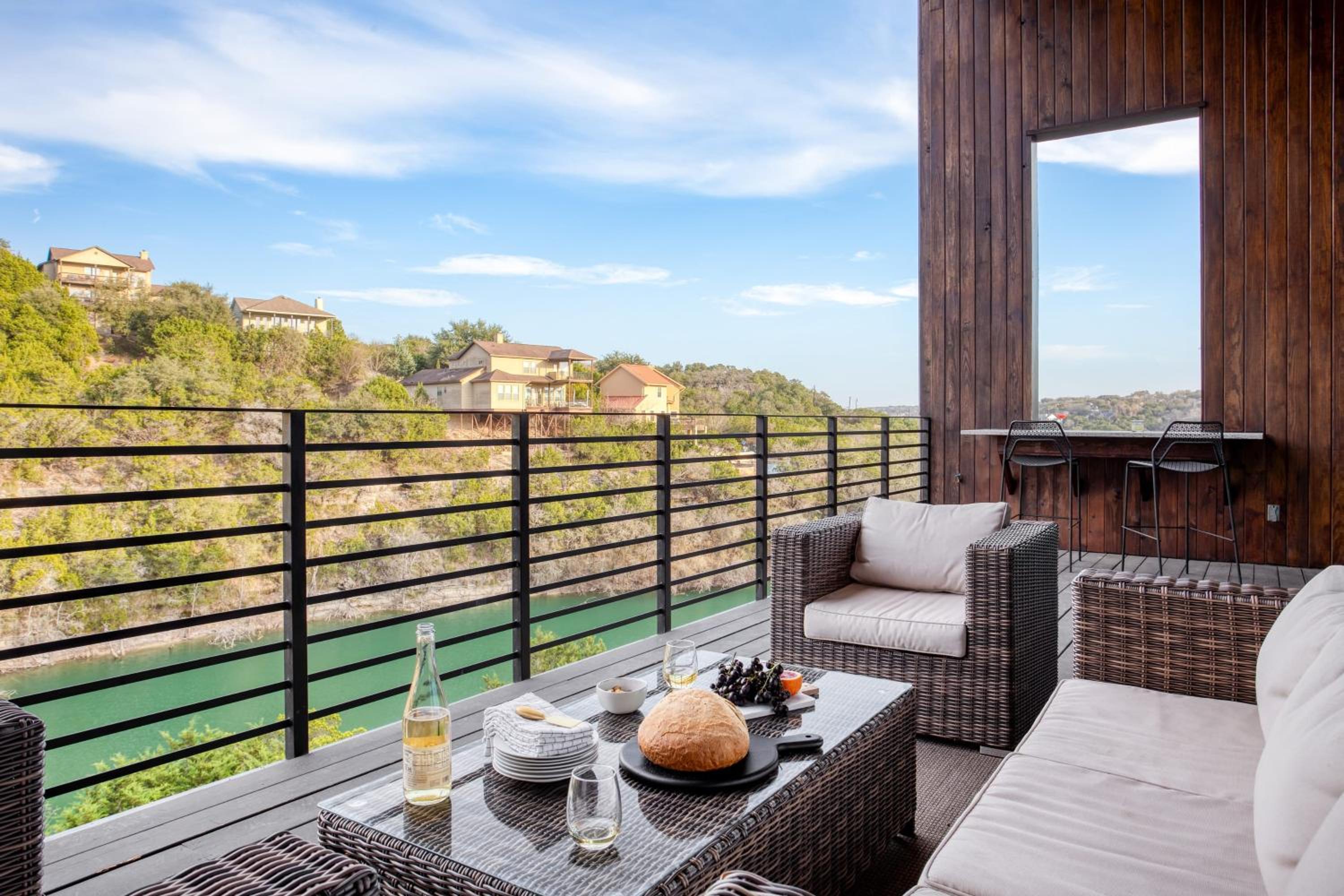 Luxurious stay w Lake View Pool Hot Tub Fire Pit Ping Pong Barton by AvantStay
