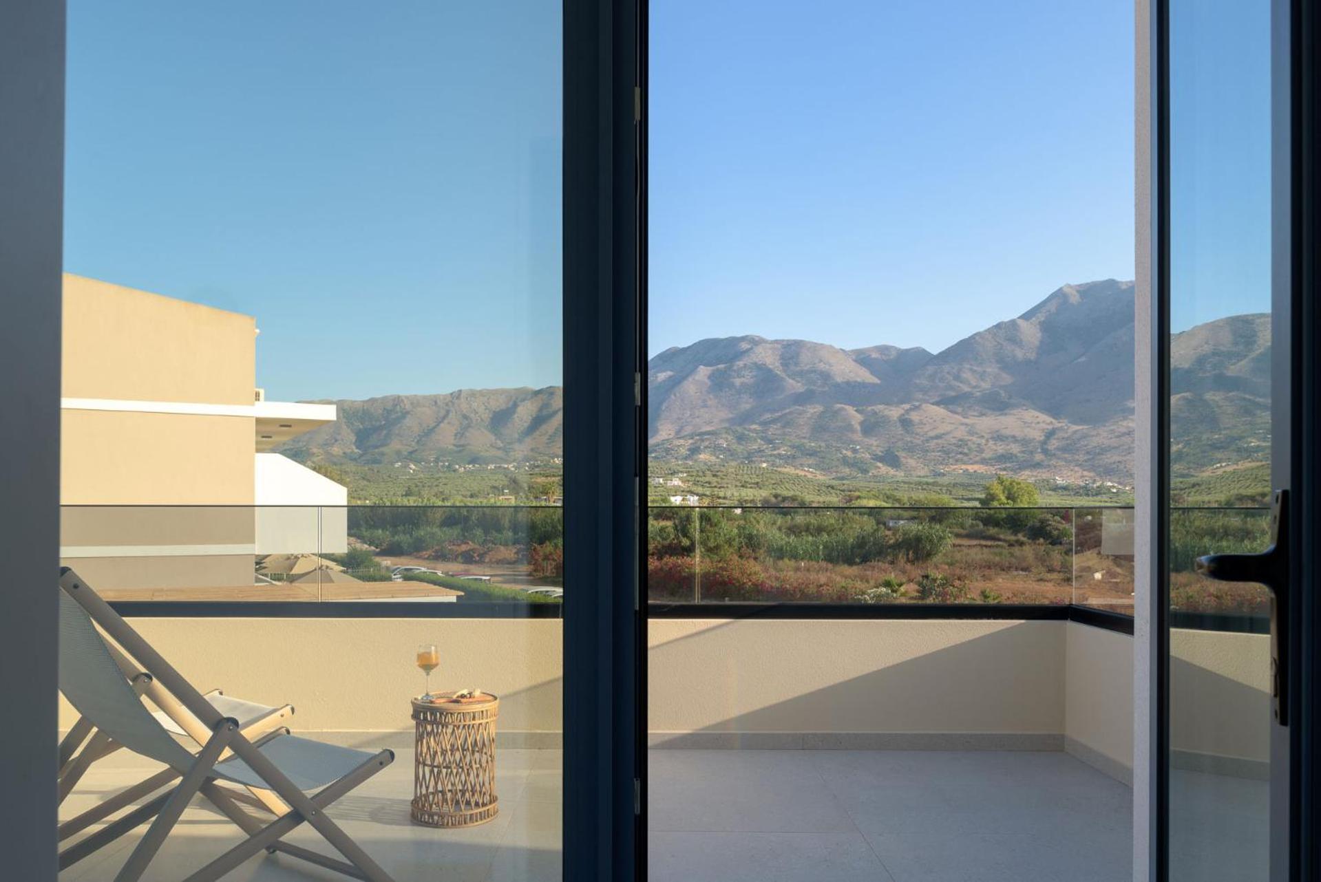 Pelagia's Loft Villas Haroupi & Rodi with Private Heated Pools, 5 Min Walking Distance to the Beach