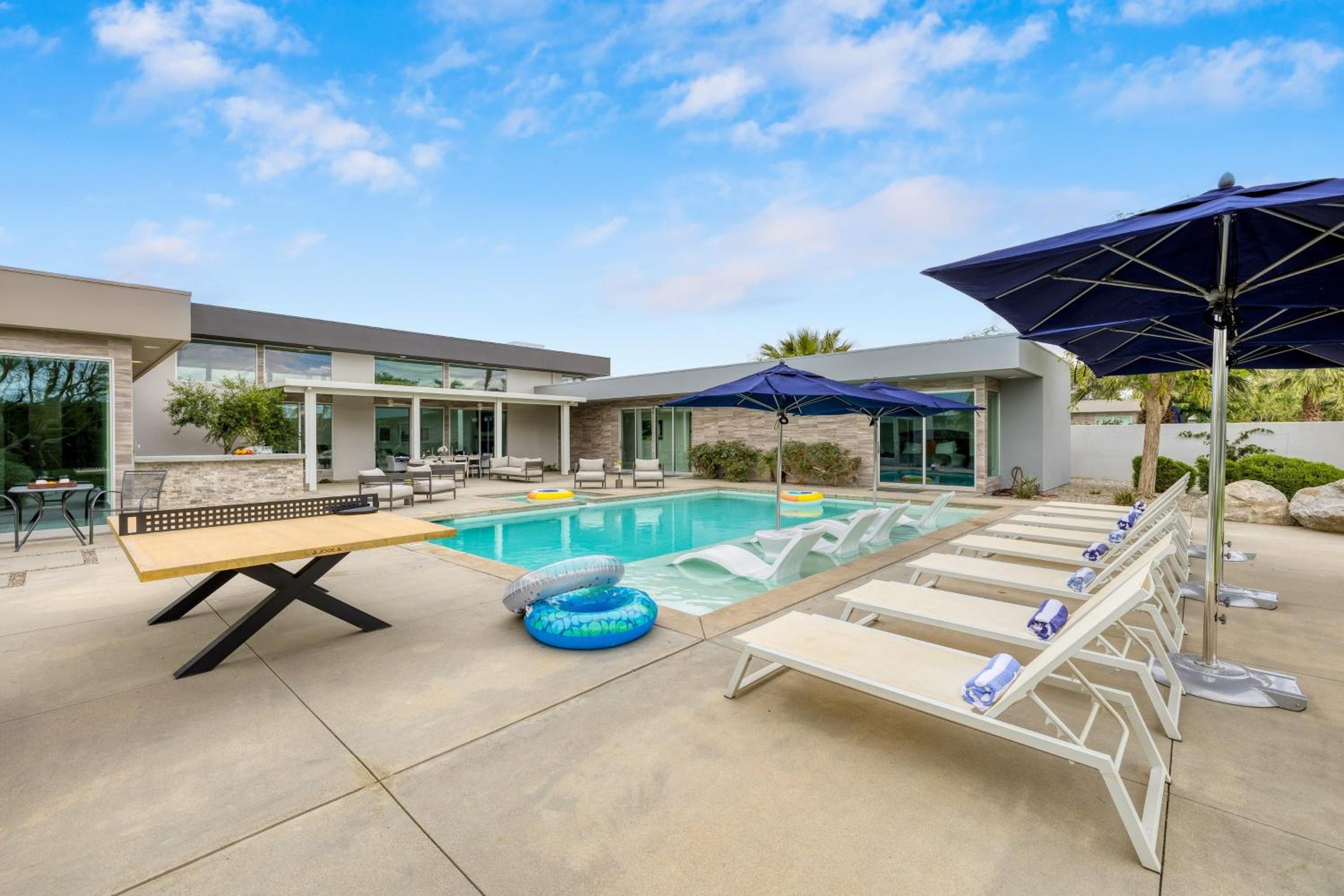 Sleeps 28 Putting Green Pool Near Coachella Polo Villas Oasis by AvantStay