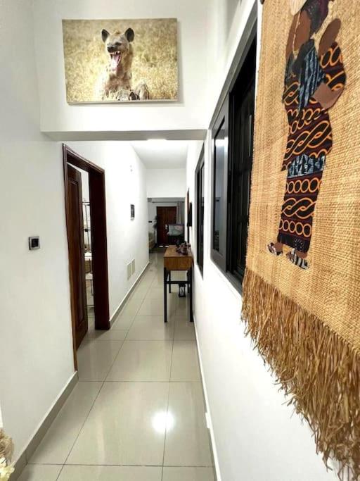 Apt 2 chambres déco africaine - aéroport à 7min, plage à 200m
