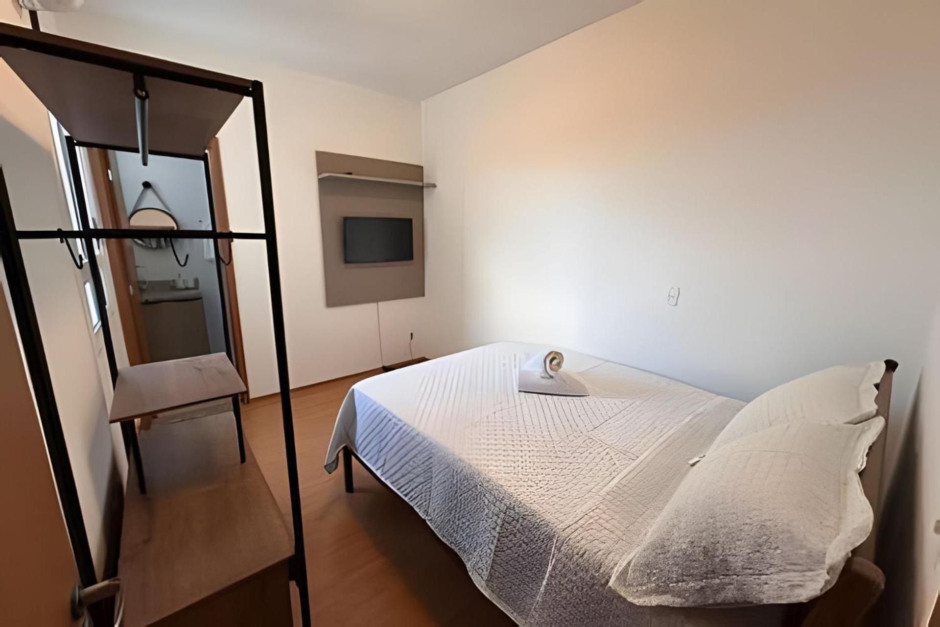 Apartamento na praia, 2 quartos e área de lazer