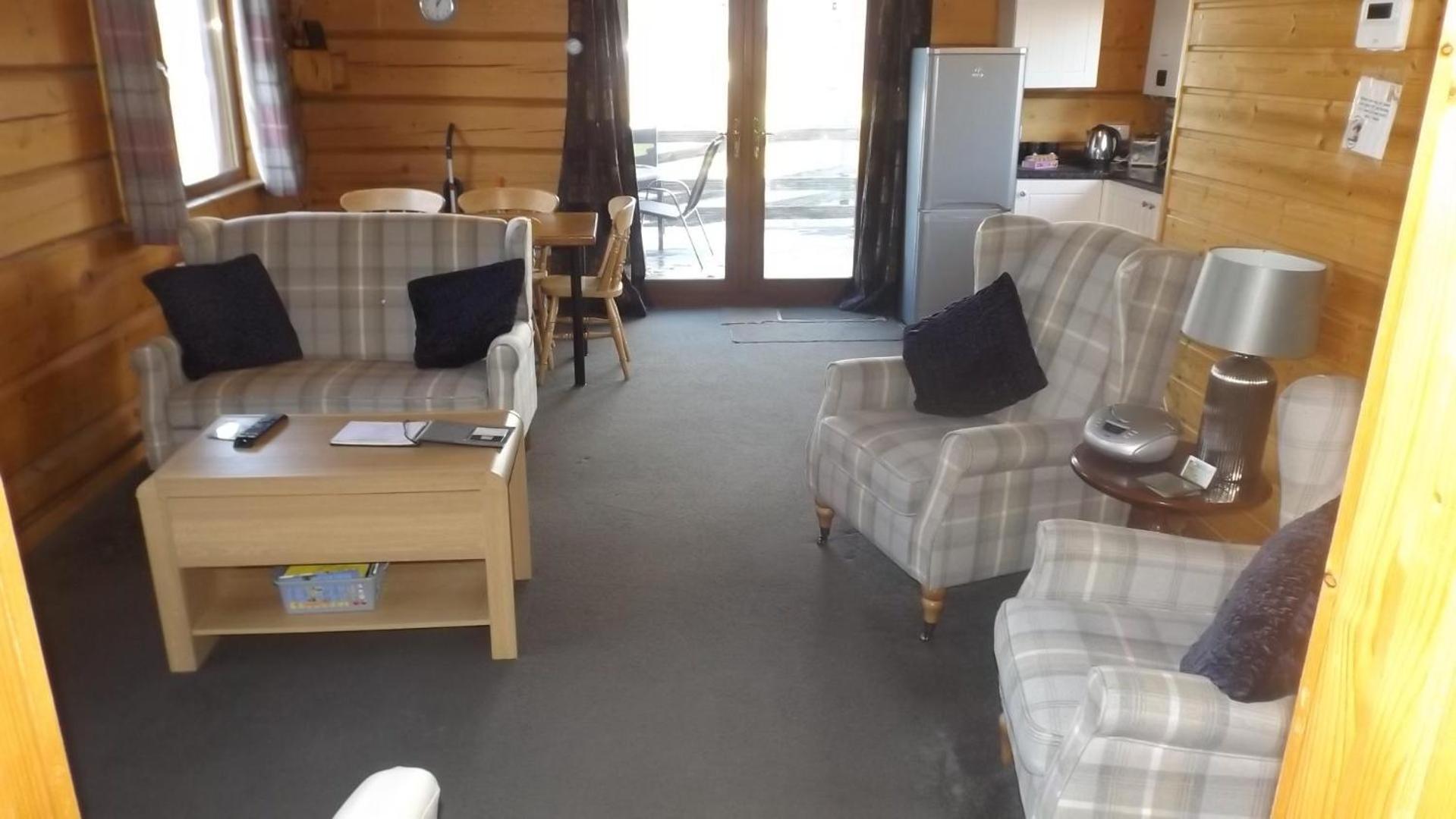 Hand built log cabin at Avonvale Holiday Lodges