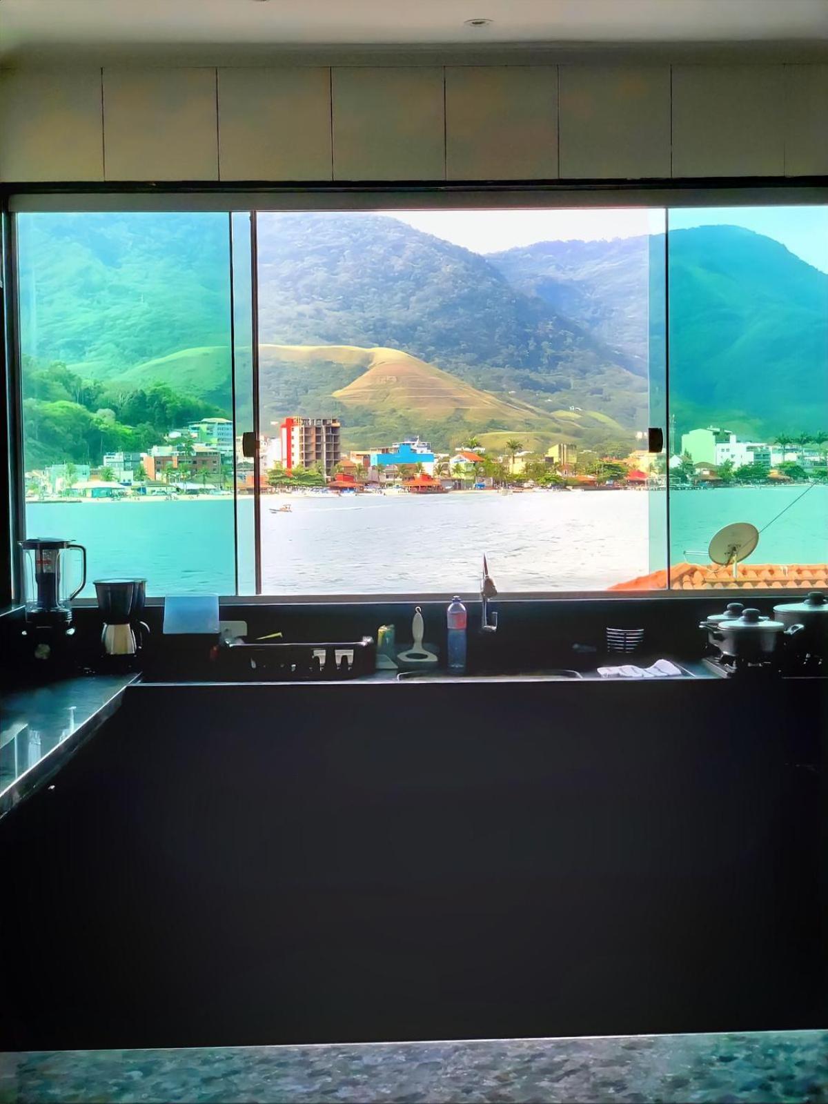 Casa na praia com vista para o mar