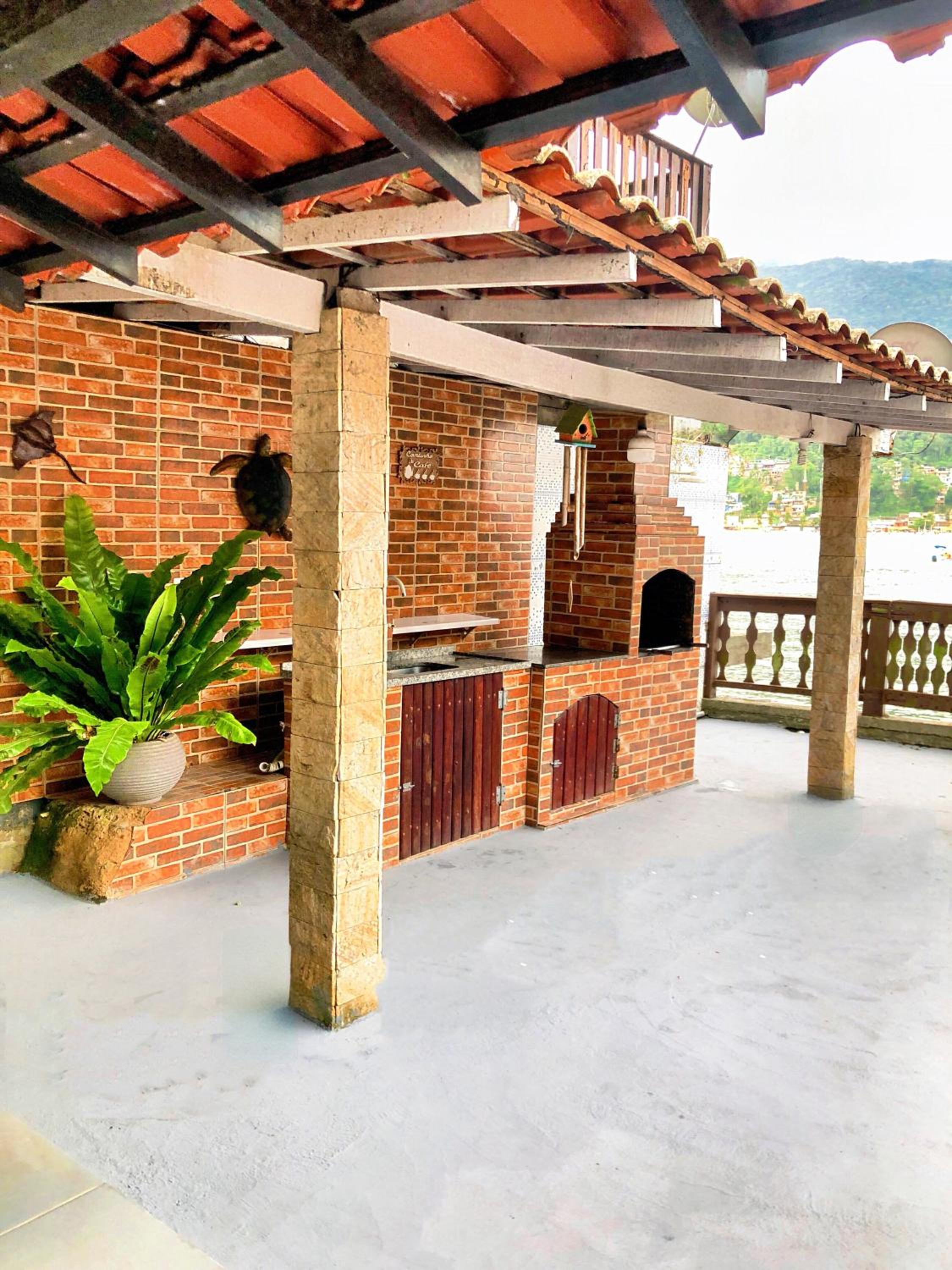 Casa na praia com vista para o mar