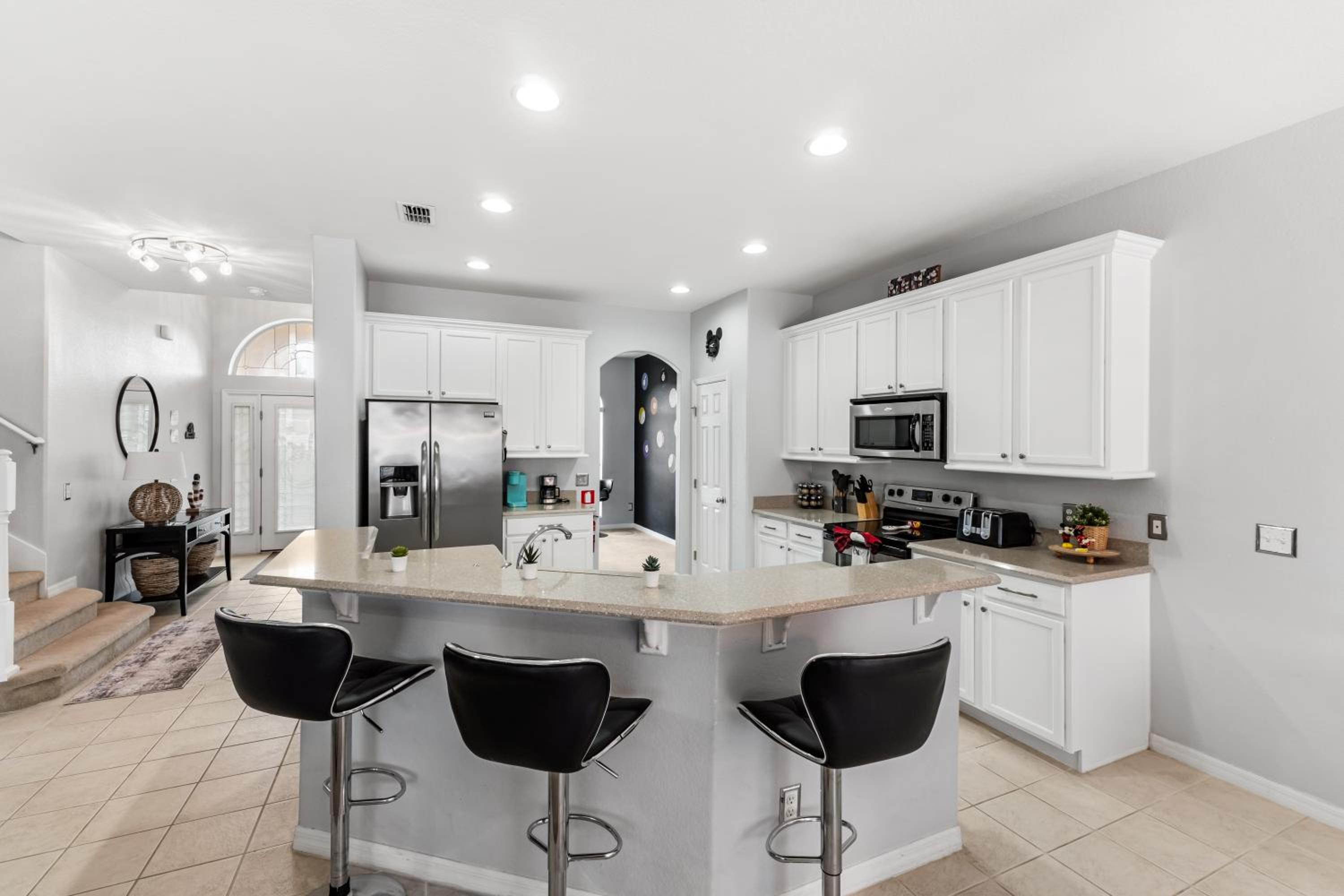 12 Min to Disney Heated Pool Family-Friendly BBQ Game Room & Sleeps 16 Guests